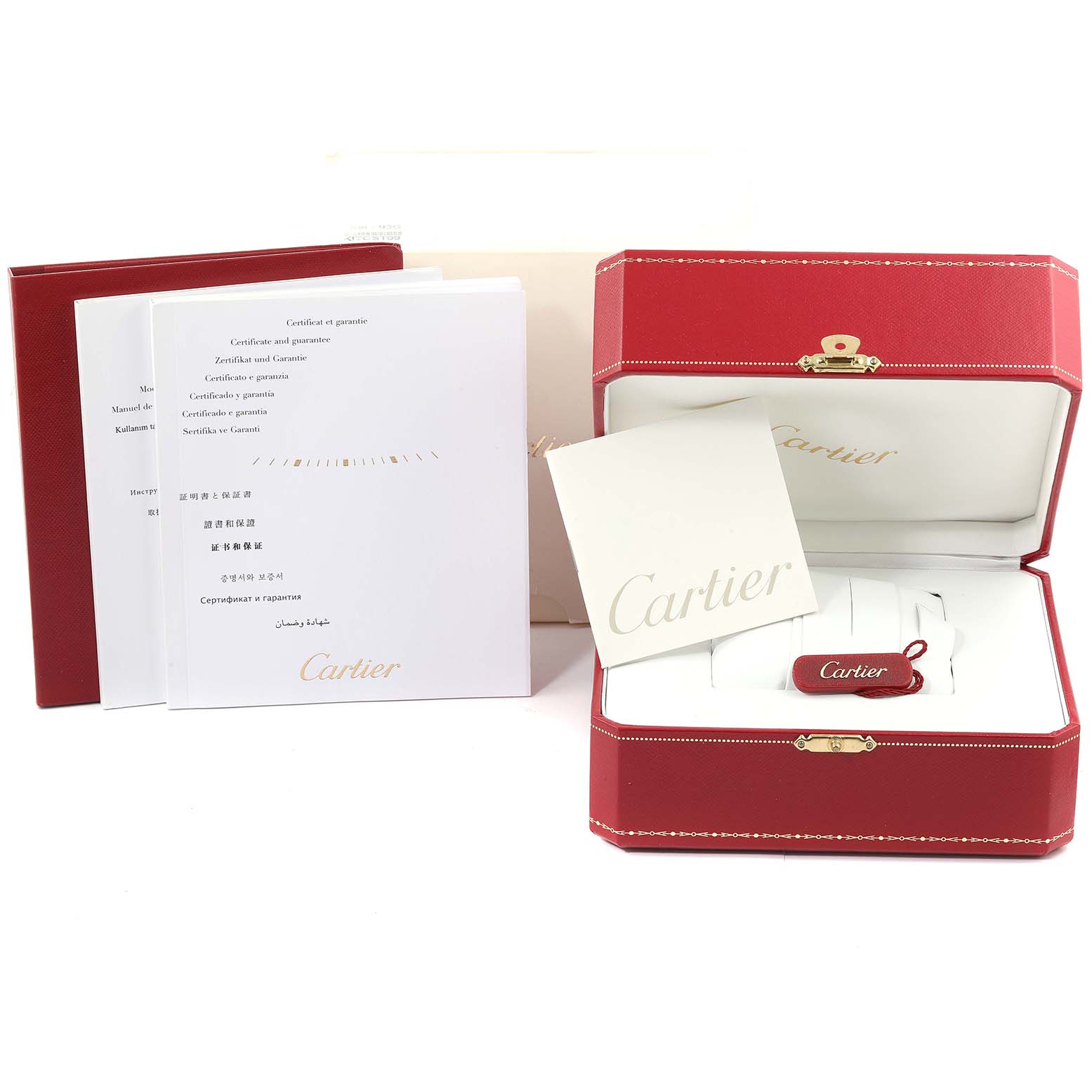 The image shows the packaging, manual, and warranty certificate for the Cartier Tank MC W5330004 Men's Stainless Steel Black Dial W5330004 Men's Stainless Steel Black Dial watch.