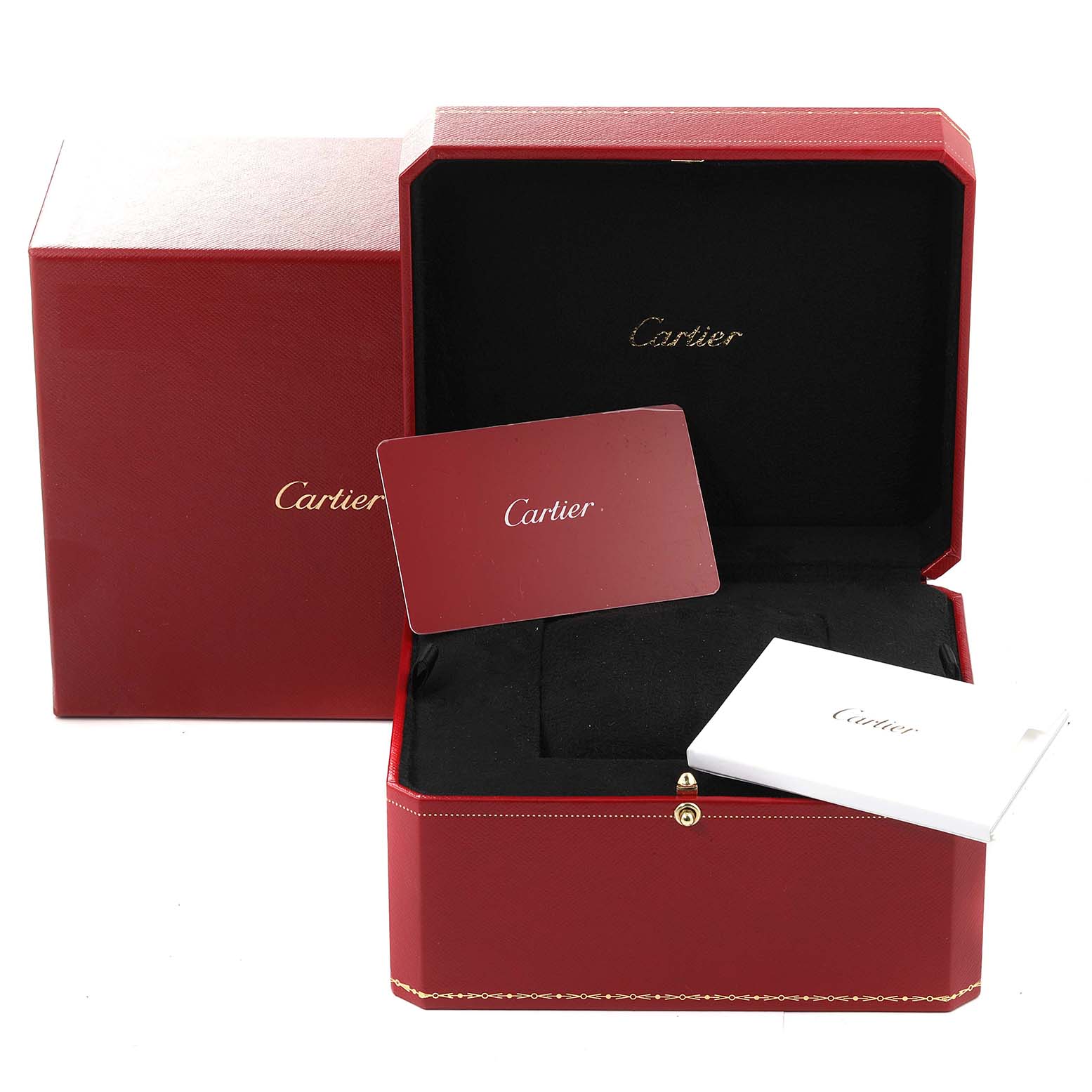 The image shows the packaging and accessories for a Cartier Tank Must WSTA0056 Women's Stainless Steel Green Dial WSTA0056 Women's Stainless Steel Green Dial watch, including the red box, booklet, and card.