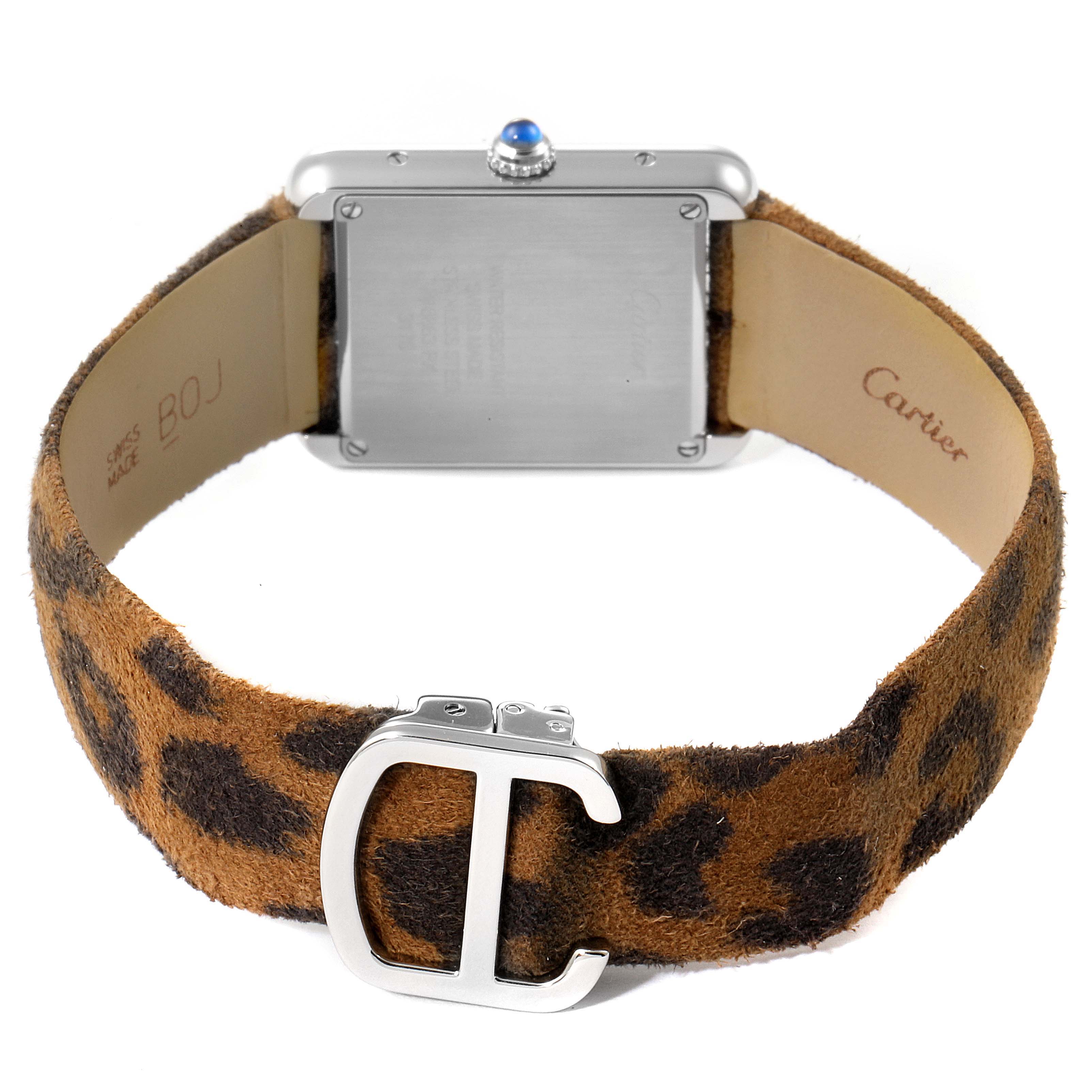 The image shows the back view of a Cartier Tank Solo W5200016 Women's Stainless Steel Silver Dial W5200016 Women's Stainless Steel Silver Dial watch, including its leopard-print strap and "C" buckle.