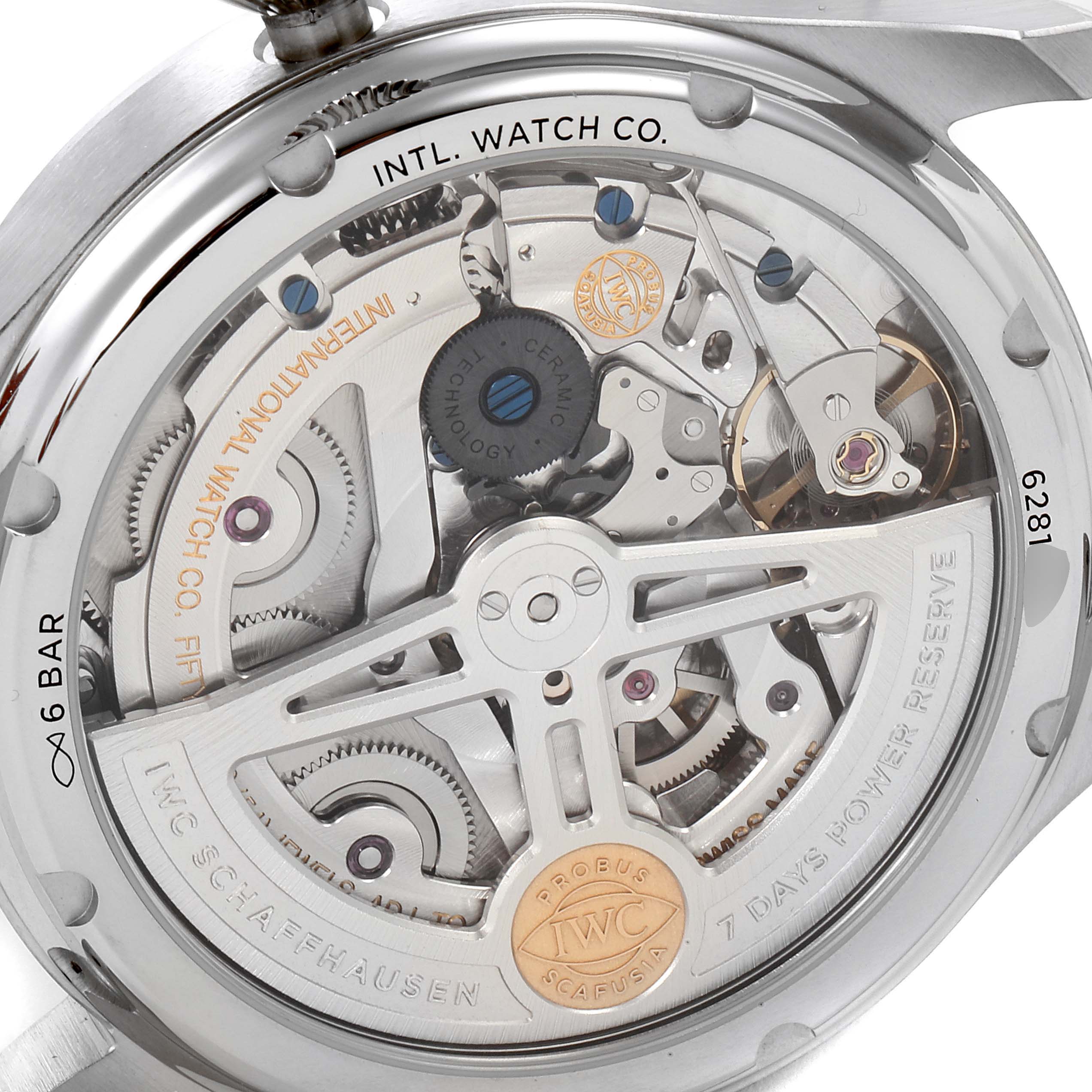 The image shows the back view of the IWC Pilot IW503605 Men's Stainless Steel Blue Dial IW503605 Men's Stainless Steel Blue Dial watch, displaying its mechanical movement and inner components.