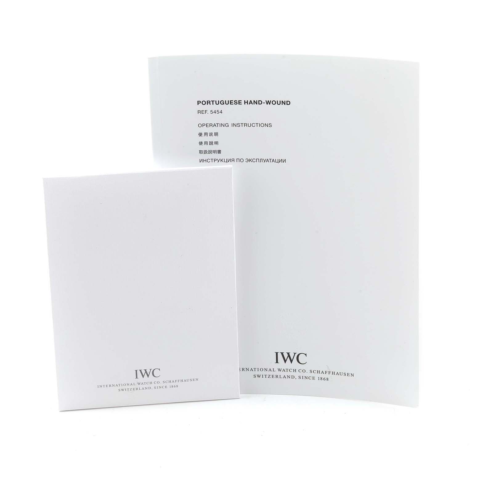 The image shows the operating instructions and paperwork for the IWC Portuguese IW544501 Men's Stainless Steel Black Dial IW544501 Men's Stainless Steel Black Dial Hand-Wound watch model.