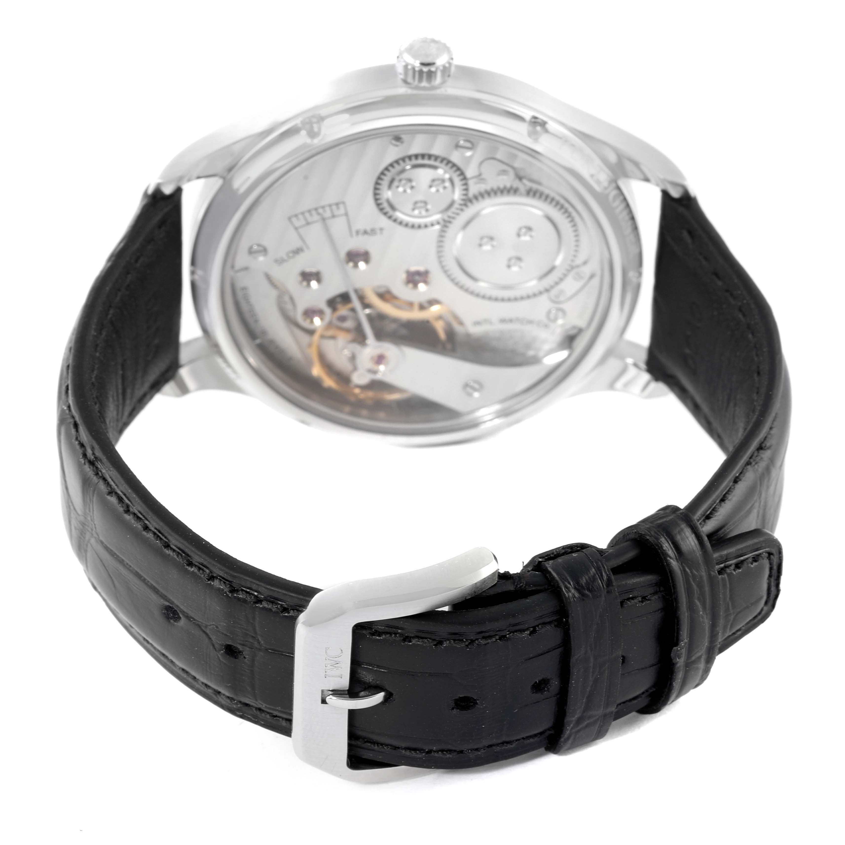 This image shows the back view of the IWC Portuguese IW544501 Men's Stainless Steel Black Dial IW544501 Men's Stainless Steel Black Dial watch, highlighting its movement and black leather strap.