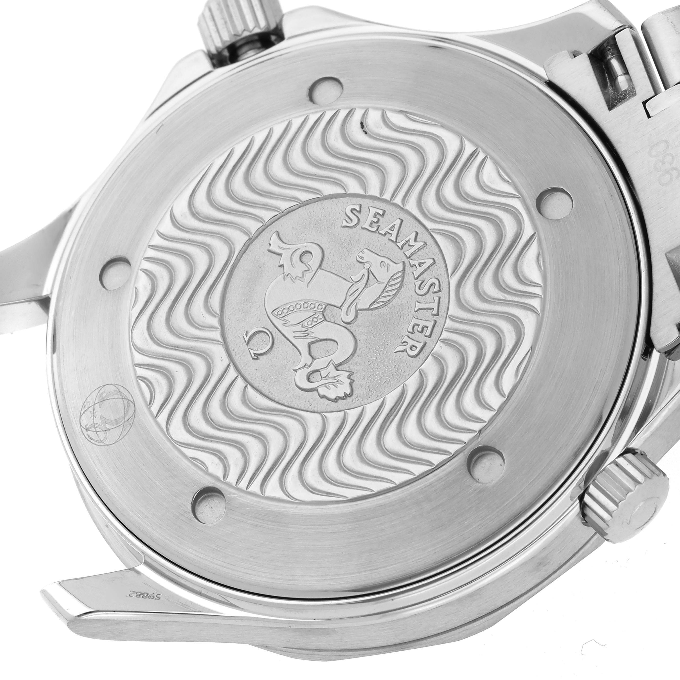 The image shows the back case of an Omega Seamaster 2264.50.00 Men
s Stainless Steel Black Dial 2264.50.00 Men
s Stainless Steel Black Dial watch from a straight-on angle, highlighting the engraved logo and wave pattern.
