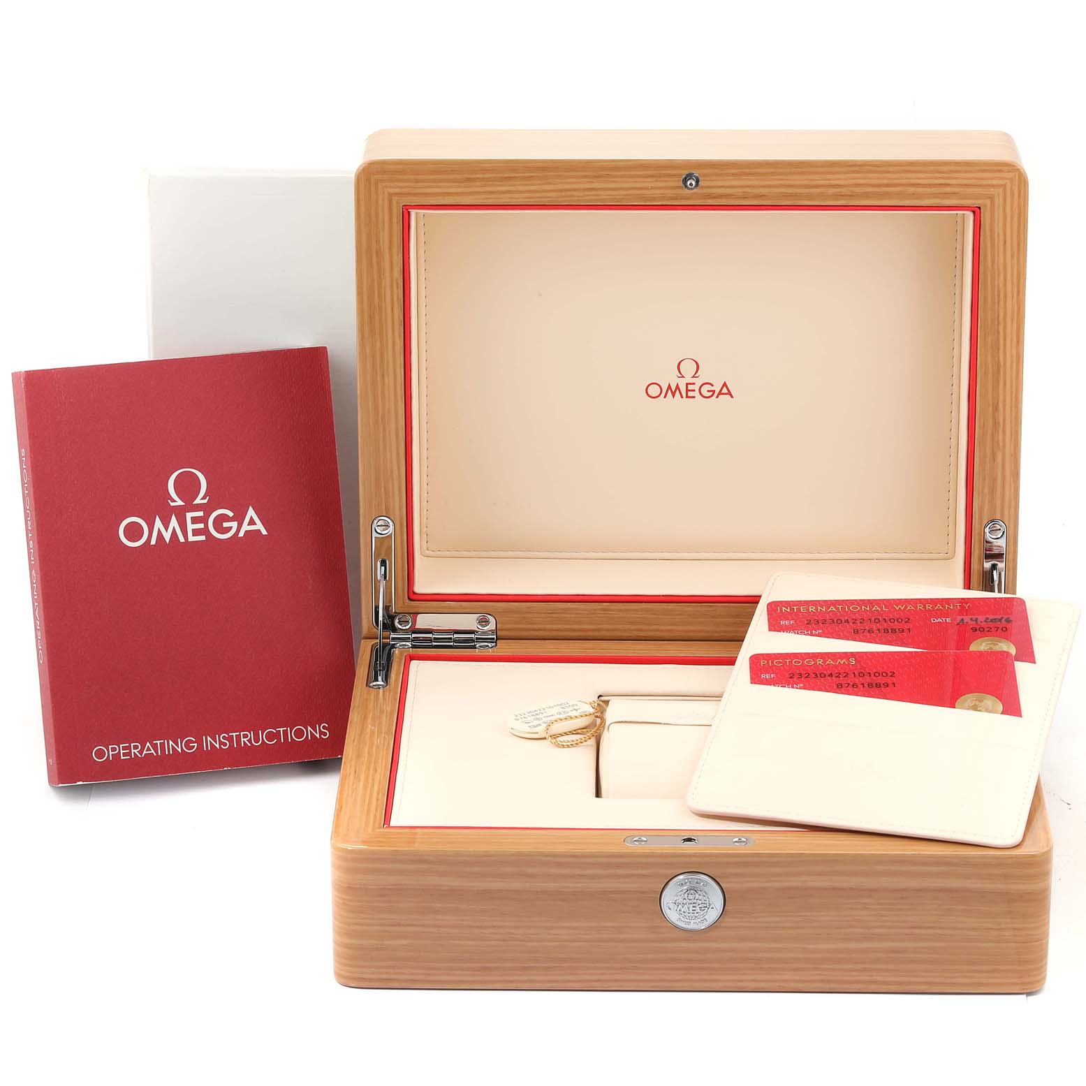 The image shows the box, warranty cards, and operating instructions booklet for the Omega Planet Ocean 232.30.42.21.01.002 Men
s Stainless Steel Black Dial 232.30.42.21.01.002 Men
s Stainless Steel Black Dial model.