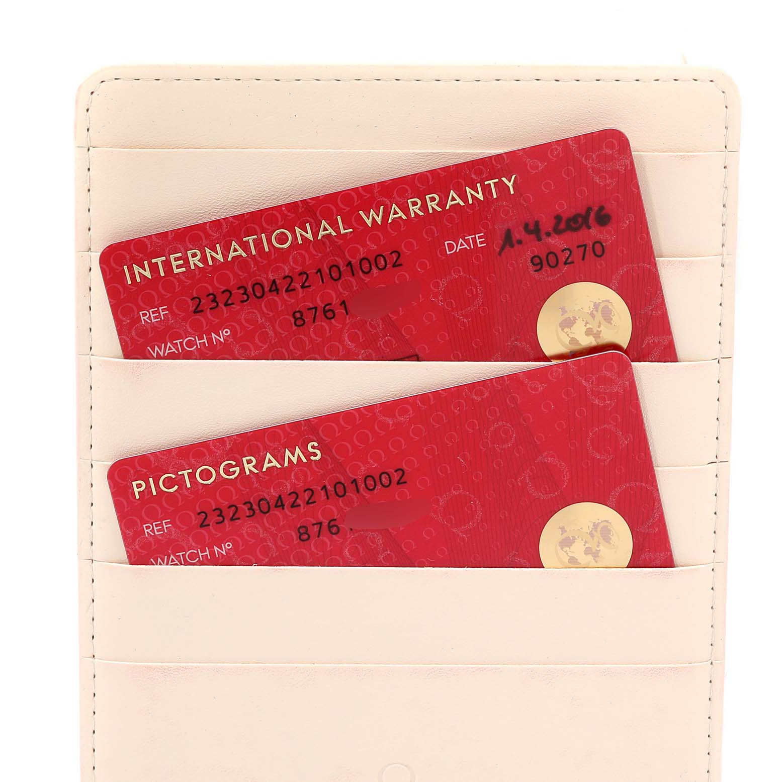 This image shows the International Warranty and Pictogram cards for the Omega Planet Ocean 232.30.42.21.01.002 Men
s Stainless Steel Black Dial 232.30.42.21.01.002 Men
s Stainless Steel Black Dial model, displayed inside a beige cardholder.