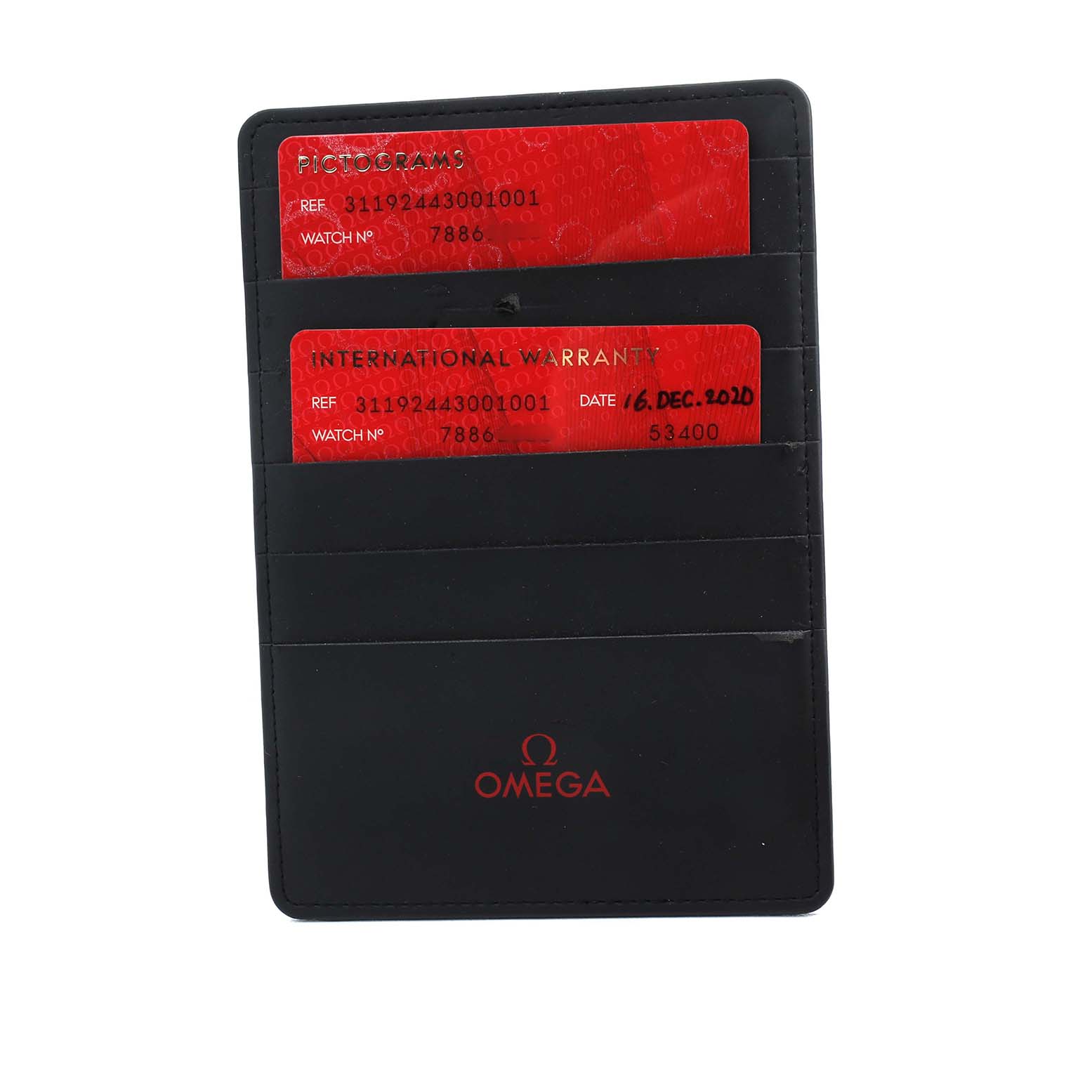 The image shows red warranty cards in a black cardholder labeled with the Omega logo, associated with the Omega Speedmaster 311.92.44.30.01.001 Men's Ceramic Black Dial model.