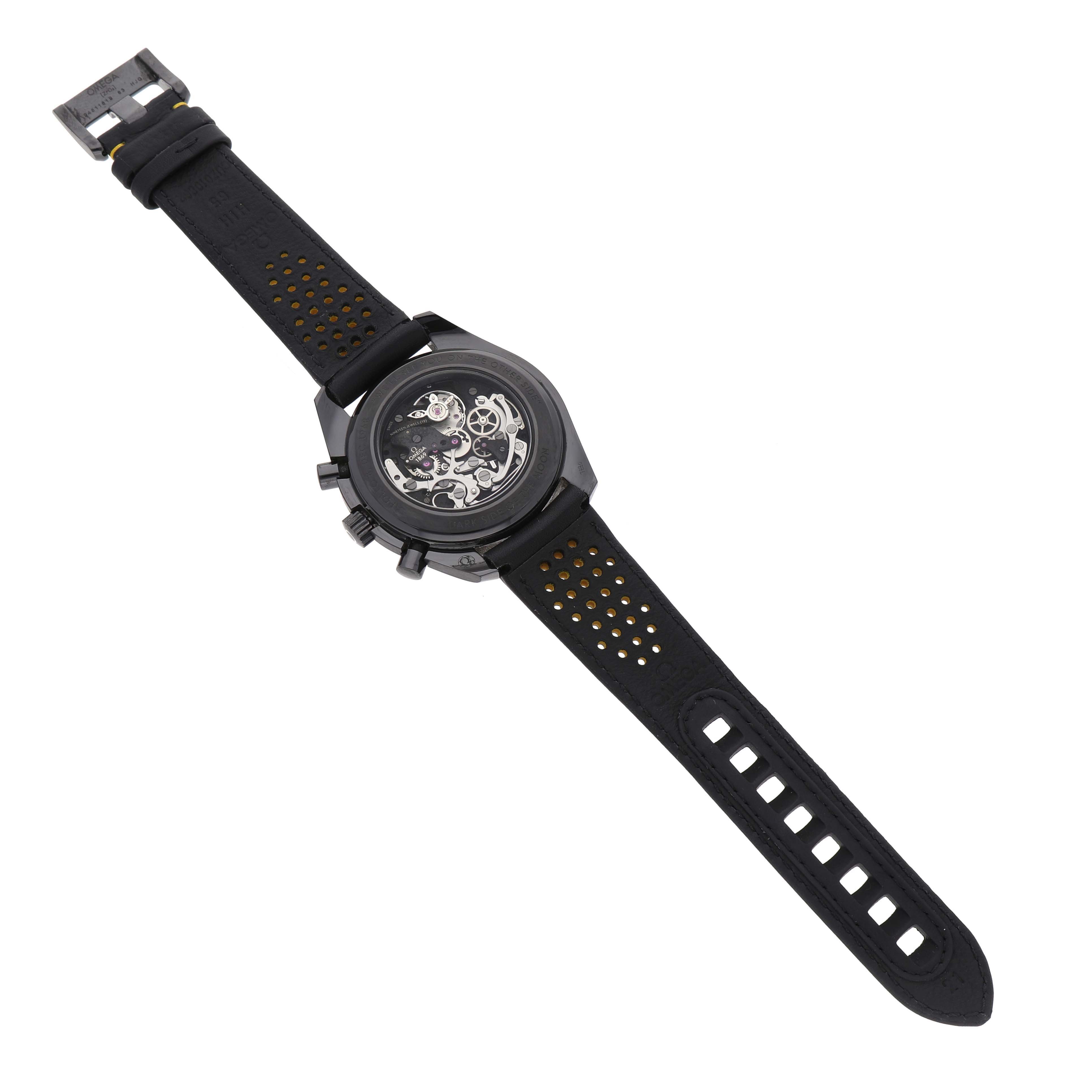 The Omega Speedmaster 311.92.44.30.01.001 Men's Ceramic Black Dial model is shown from the back, displaying its skeleton movement and black perforated strap.