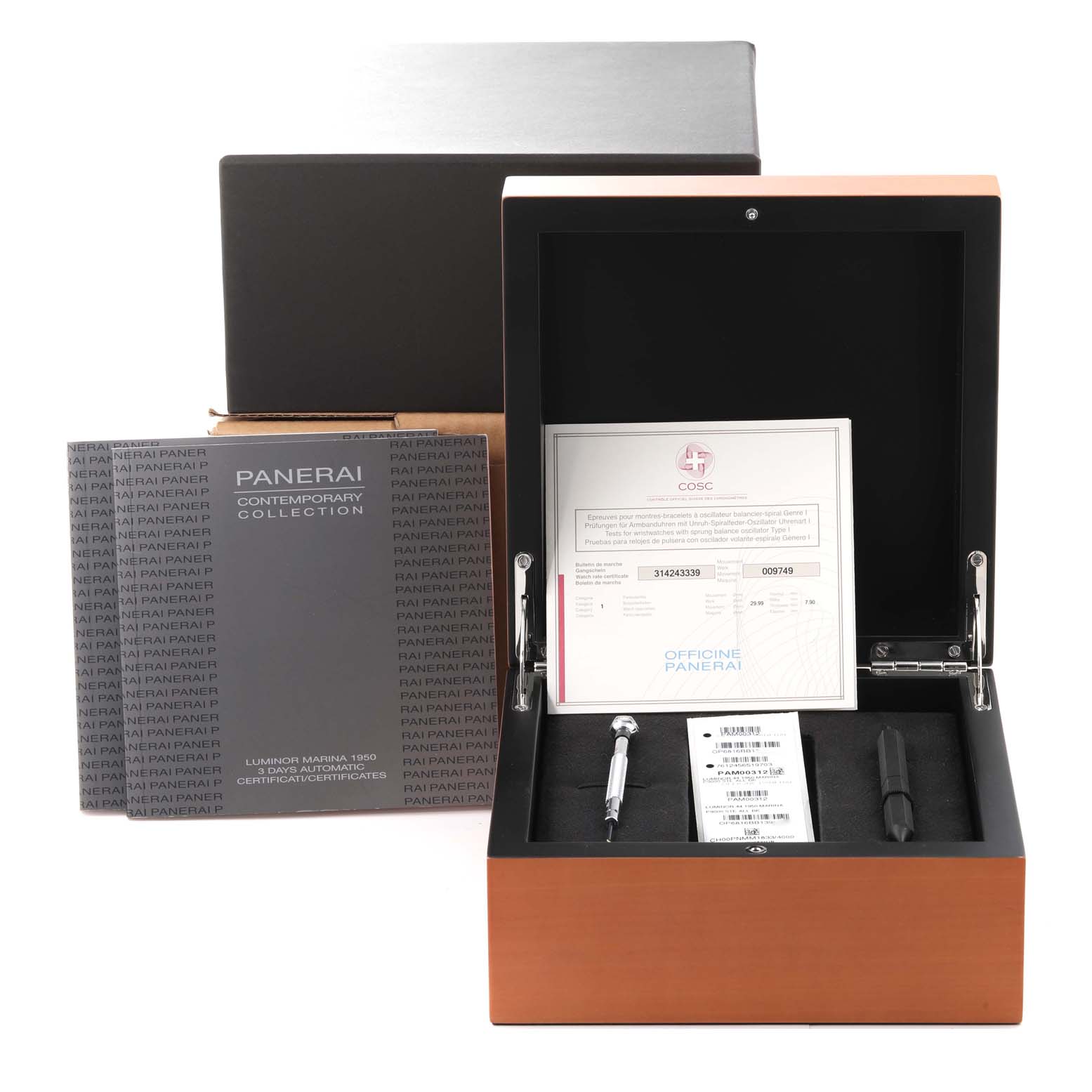 The image shows an open box of a Panerai Luminor PAM00312 Men's Stainless Steel Black Dial PAM00312 Men's Stainless Steel Black Dial model watch with manuals and tools from a front angle.