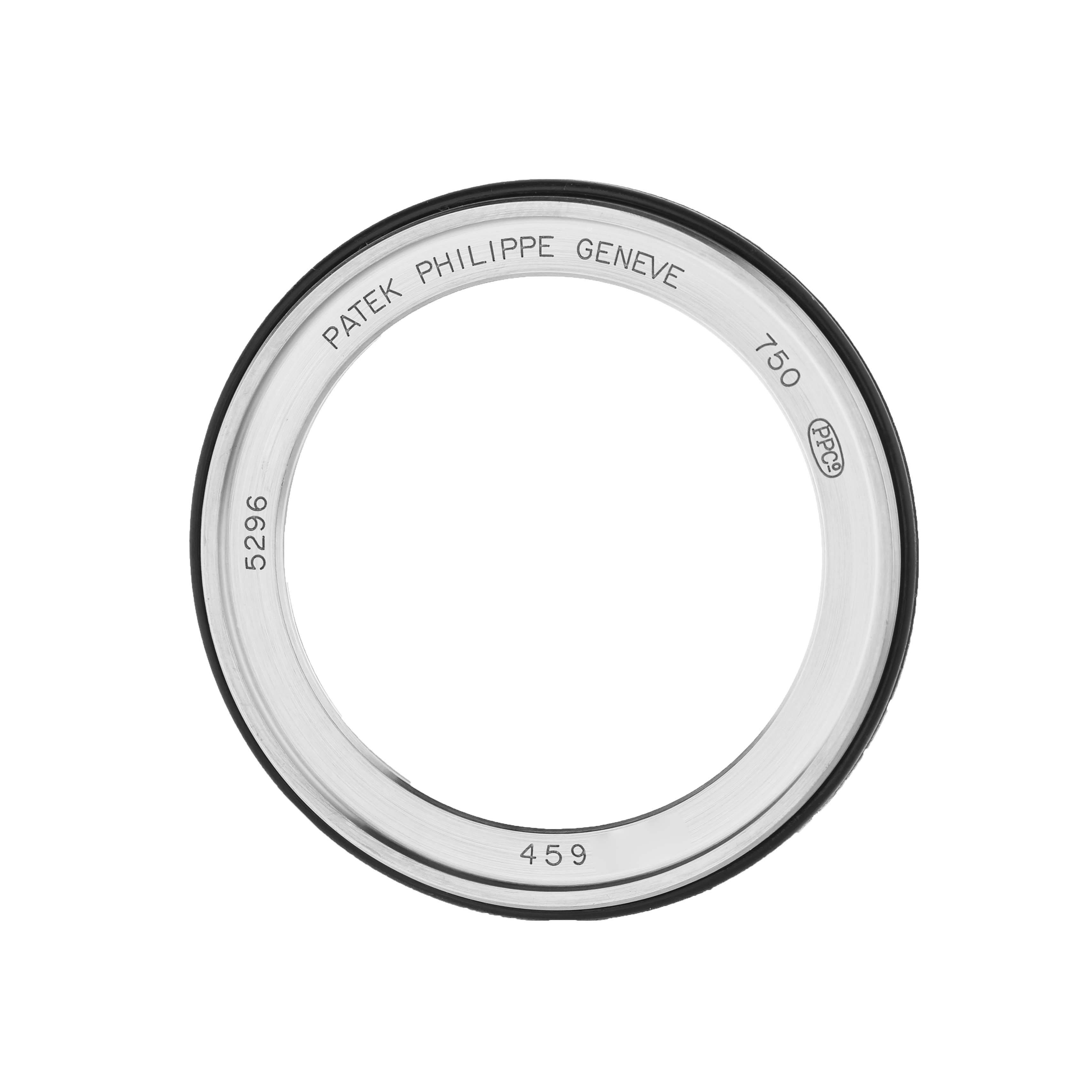 The image shows a bezel of a Patek Philippe Calatrava 5296G Men's White Gold Silver Dial watch model, viewed from a top angle.