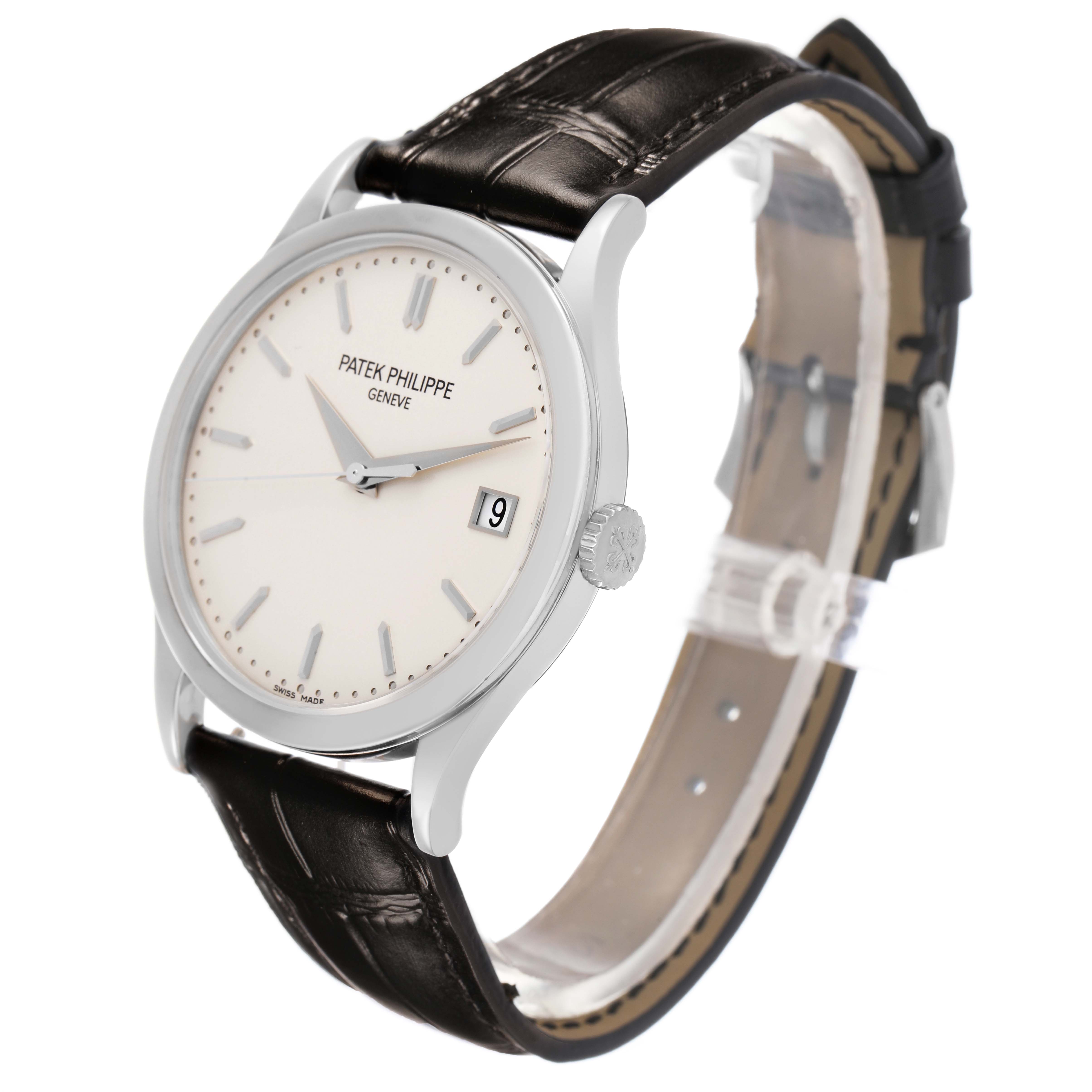 The Patek Philippe Calatrava 5296G Men's White Gold Silver Dial watch is shown at a three-quarter angle, displaying the dial, case, crown, and leather strap.