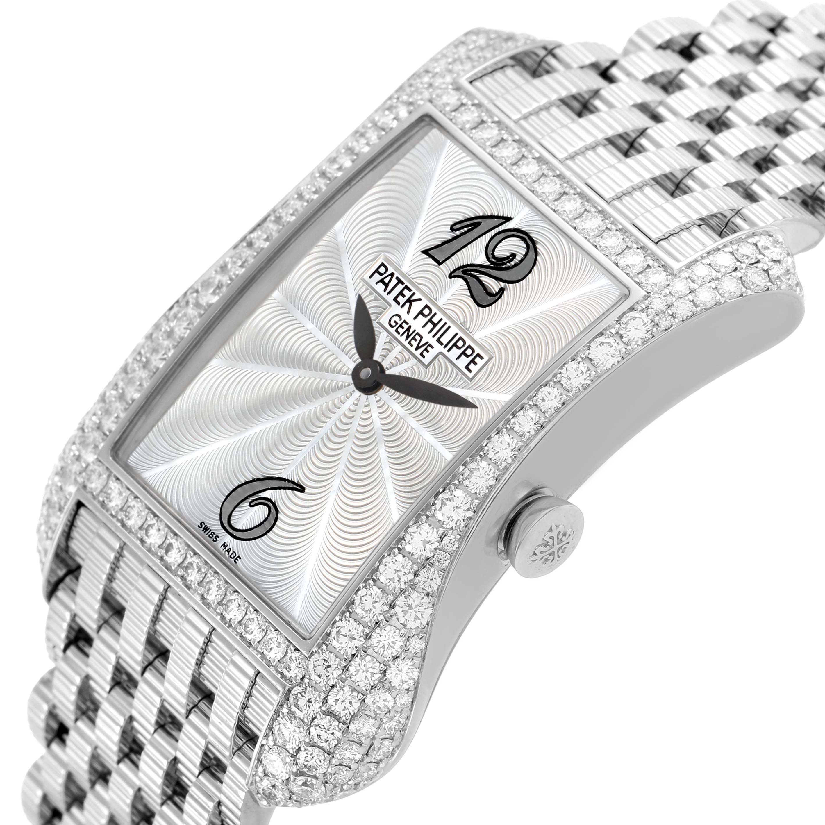 The Patek Philippe Gondolo 4972G Women's White Gold Mother of Pearl Dial watch is shown from a side angle, highlighting the diamond-studded case, rectangular dial, and bracelet.