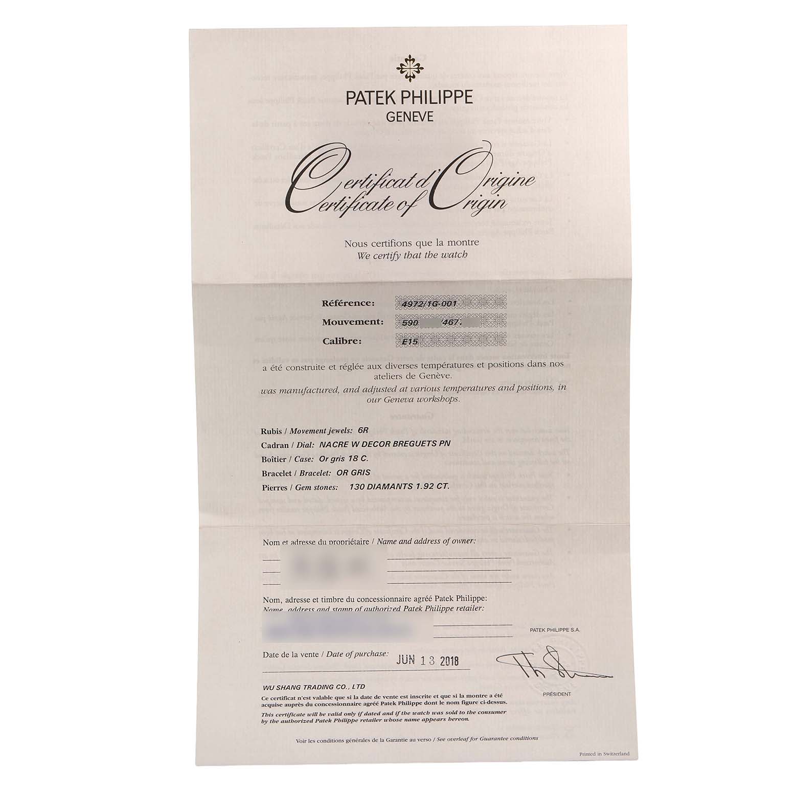 The image shows a Patek Philippe Gondolo 4972G Women's White Gold Mother of Pearl Dial certificate of origin laying flat, detailing the watch's specifications and authenticity.