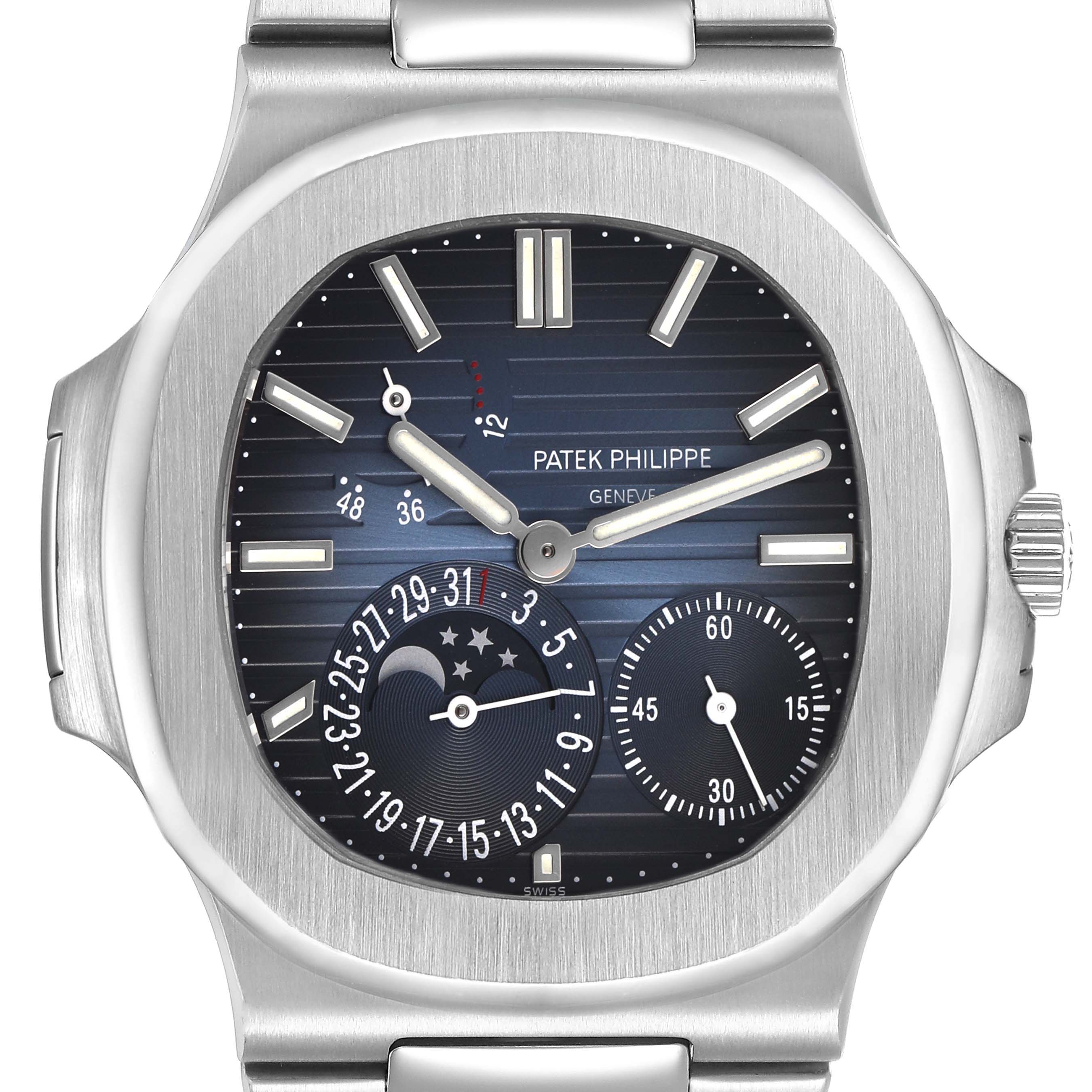 The Patek Philippe Nautilus 5712A Men's Stainless Steel Blue Dial watch is shown from the front, highlighting the dial, sub-dials, and bezel.