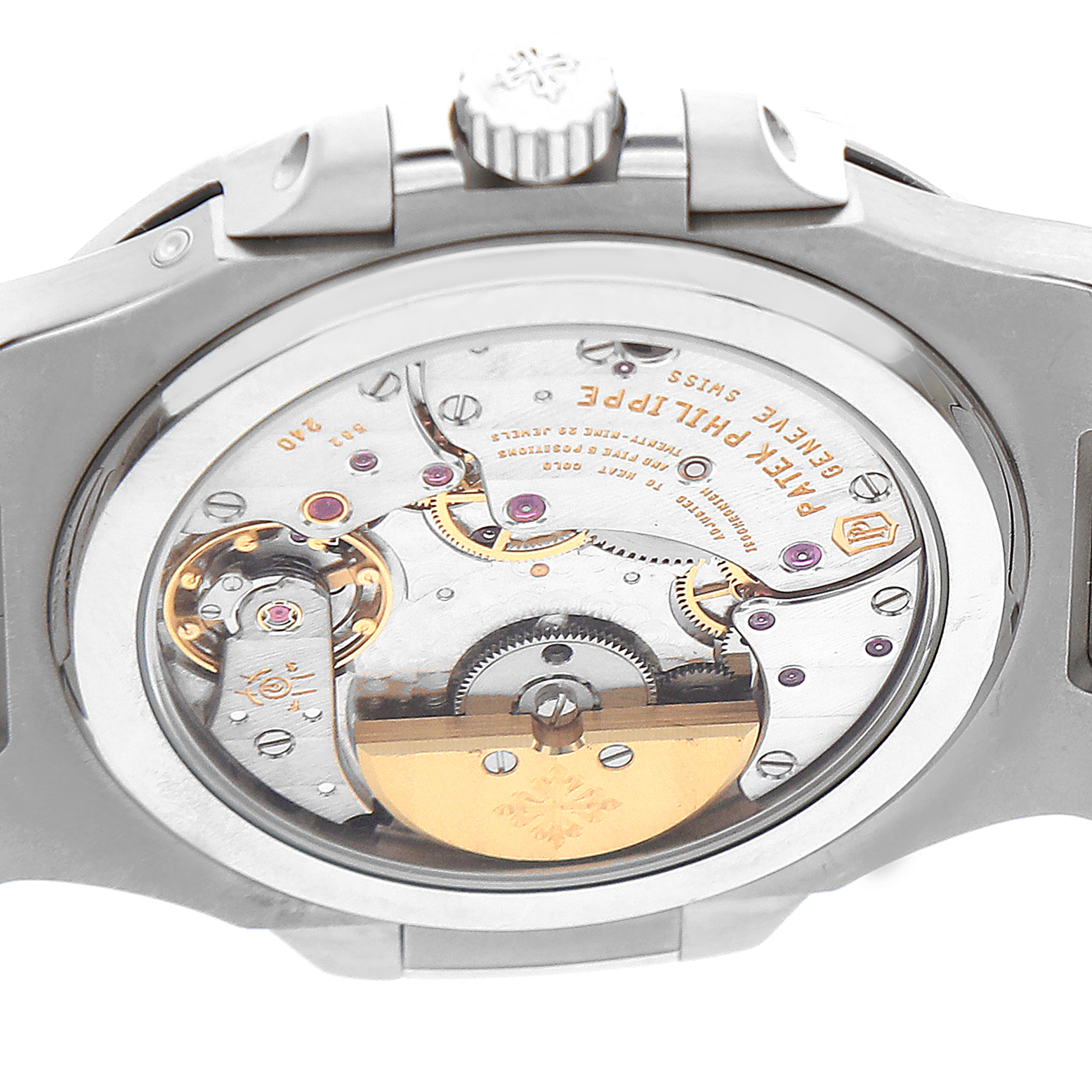 The image shows the back of a Patek Philippe Nautilus 5712A Men's Stainless Steel Blue Dial watch, highlighting its movement and mechanical components.