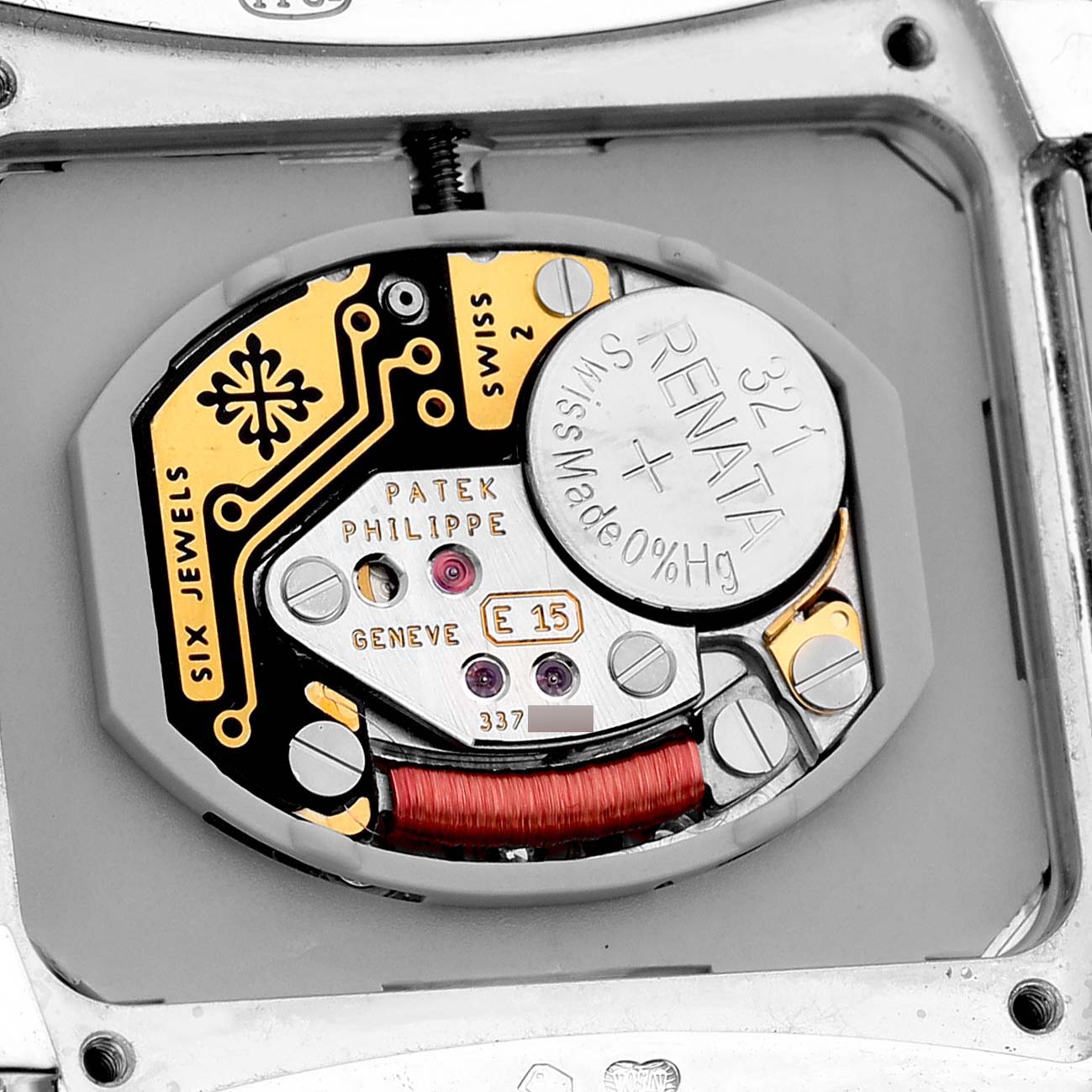 The image shows a close-up of the movement mechanism inside a Patek Philippe Twenty-4 4920G Women's White Gold Silver Dial watch.
