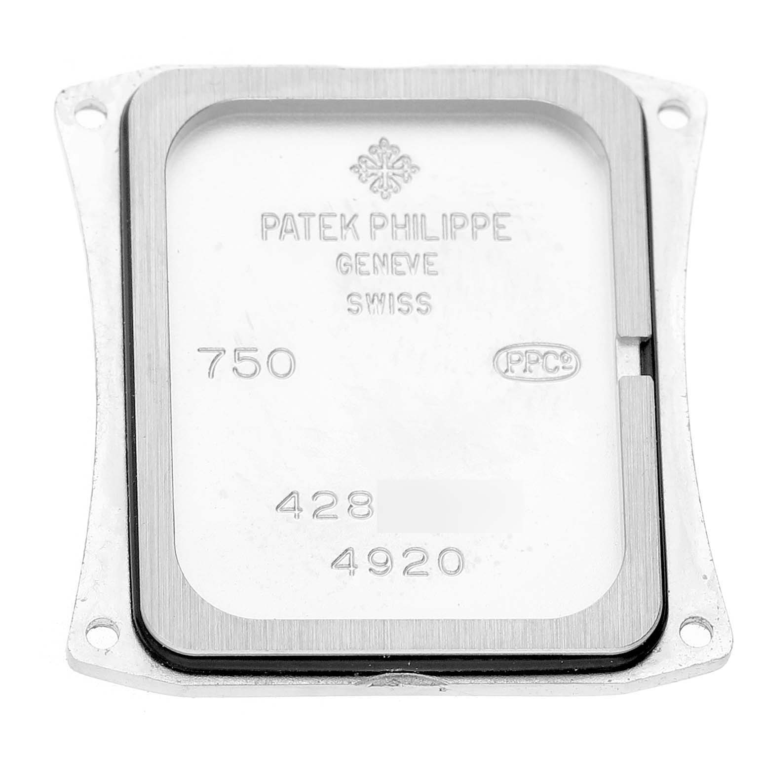 The image shows the back cover of a Patek Philippe Twenty-4 4920G Women's White Gold Silver Dial watch from a top view, highlighting its inscriptions and details.