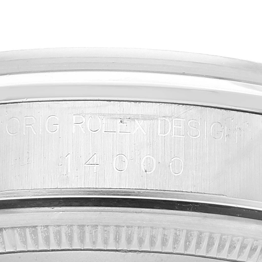 The image shows a close-up view of the case back edge of a Rolex Air-King 14000 Men's Stainless Steel Pink Dial 14000 Men's Stainless Steel Pink Dial model, displaying the engraved model number "14000" and "ORIG ROLEX DESIGN."