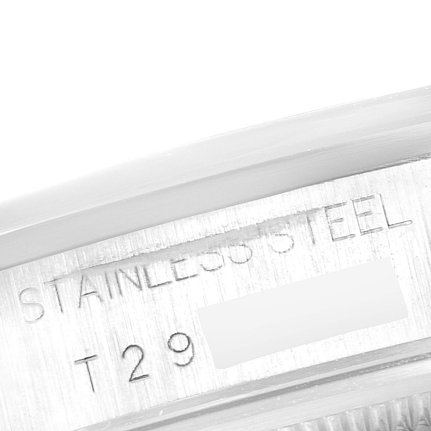 This image shows a close-up of the engraving on the stainless steel casing of a Rolex Air-King 14000 Men's Stainless Steel Silver Dial 14000 Men's Stainless Steel Silver Dial watch.