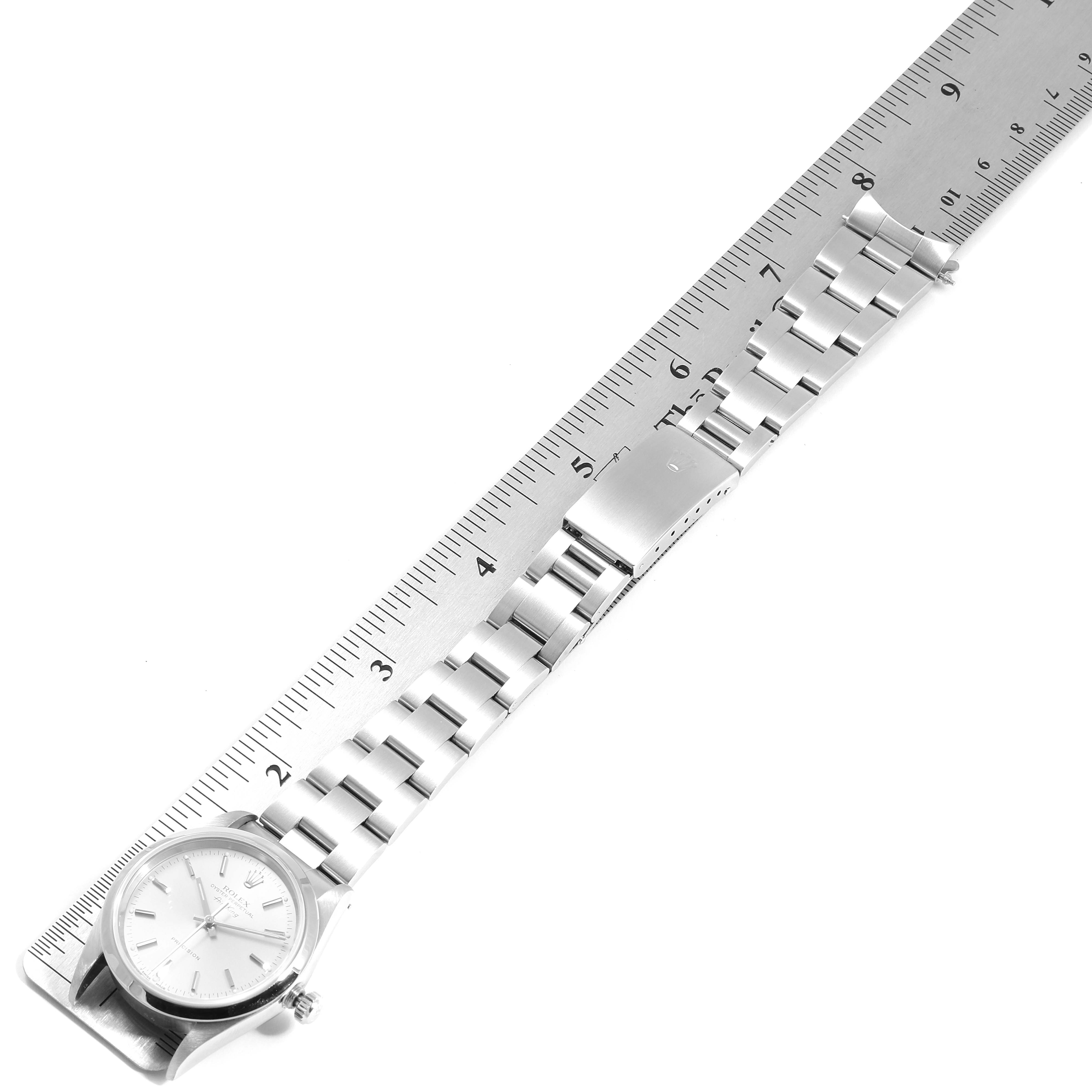 The image shows a Rolex Air-King 14000 Men's Stainless Steel Silver Dial 14000 Men's Stainless Steel Silver Dial watch laid flat next to a ruler, highlighting the bracelet and clasp.