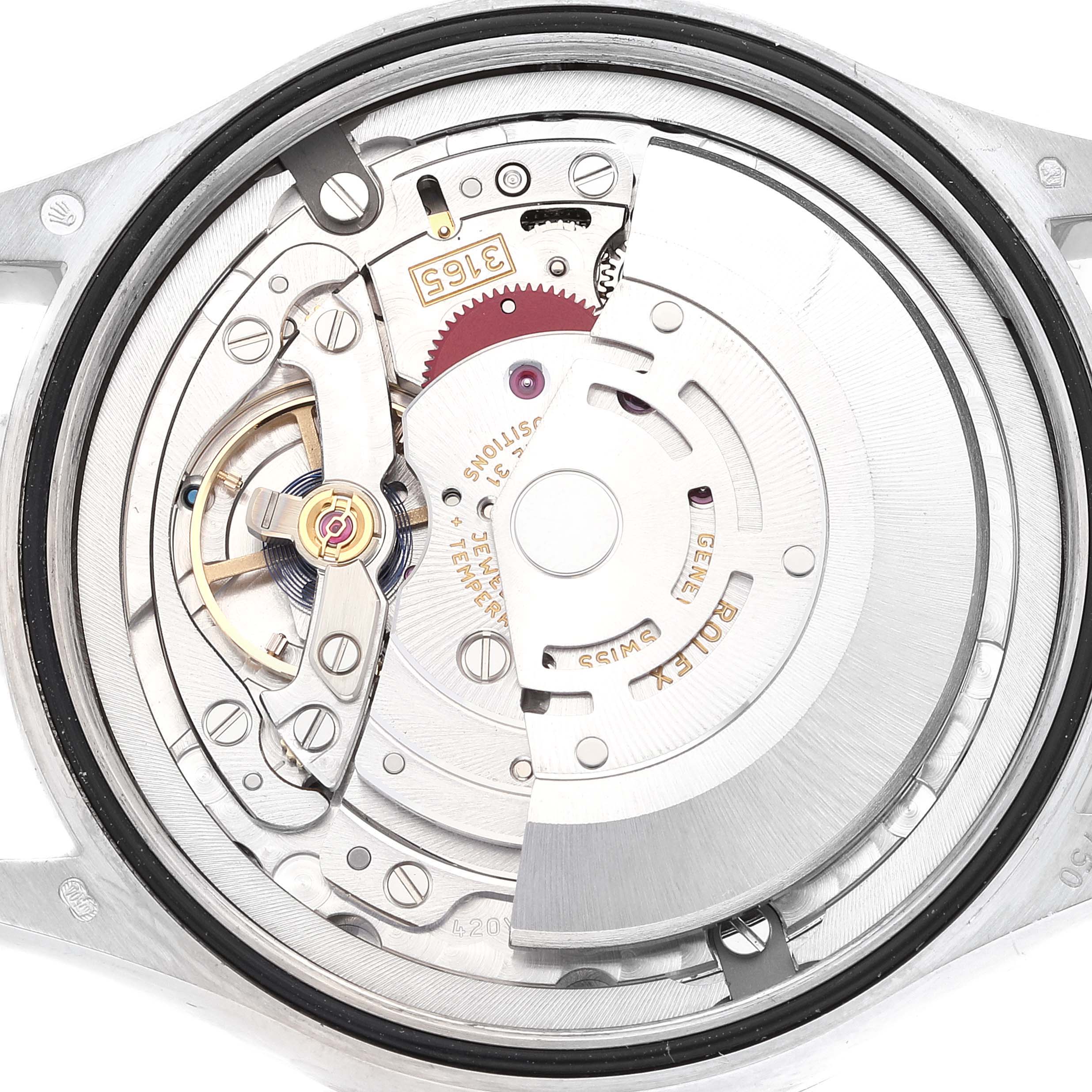 This image shows the inner mechanism and movement of a Rolex Cellini 50519 Men's White Gold Black Dial 50519 Men's White Gold Black Dial watch from a top-down angle with open case back.
