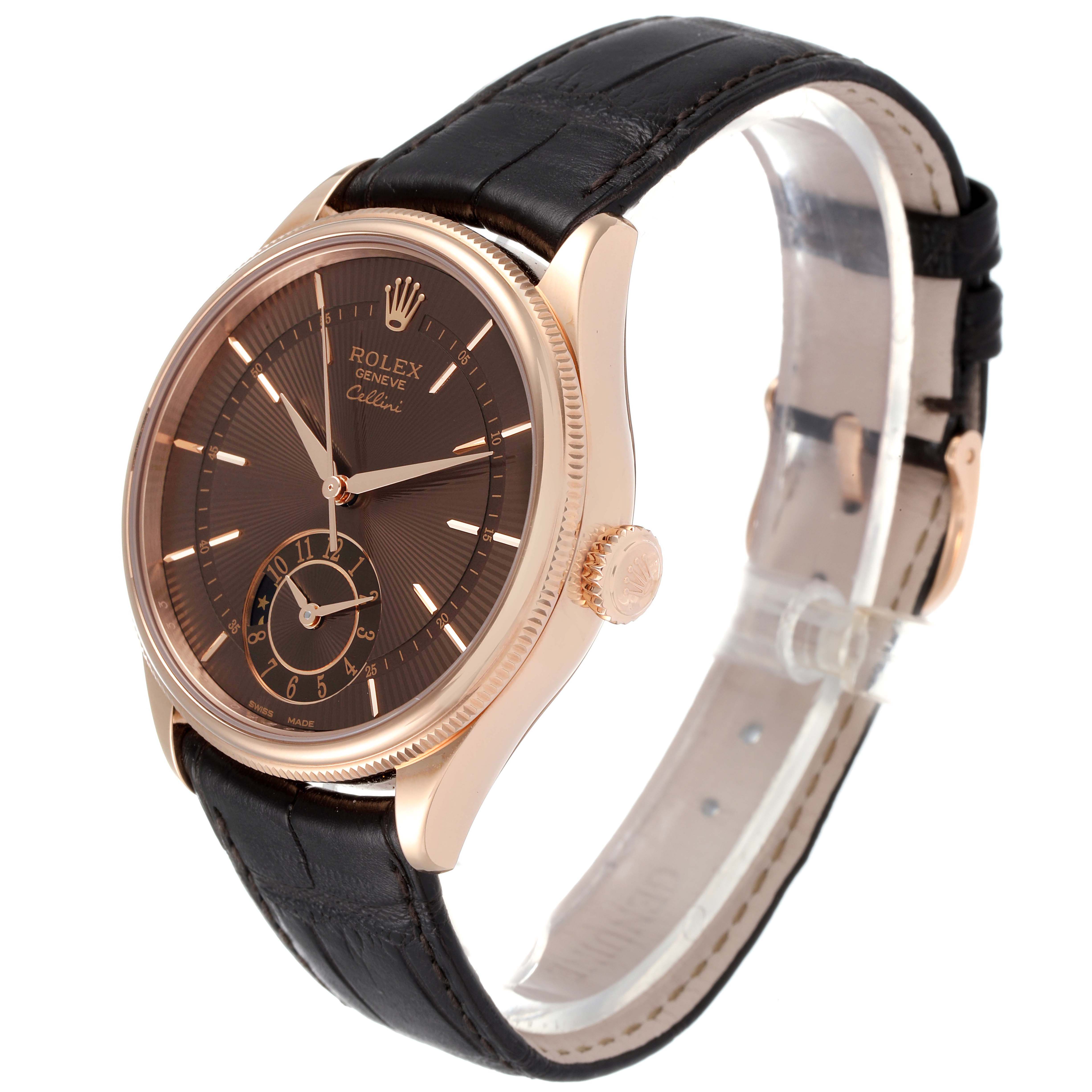 The image shows a Rolex Cellini 50525 Men
s Rose Gold Brown Dial 50525 Men
s Rose Gold Brown Dial watch angled to display its face, crown, and leather strap.