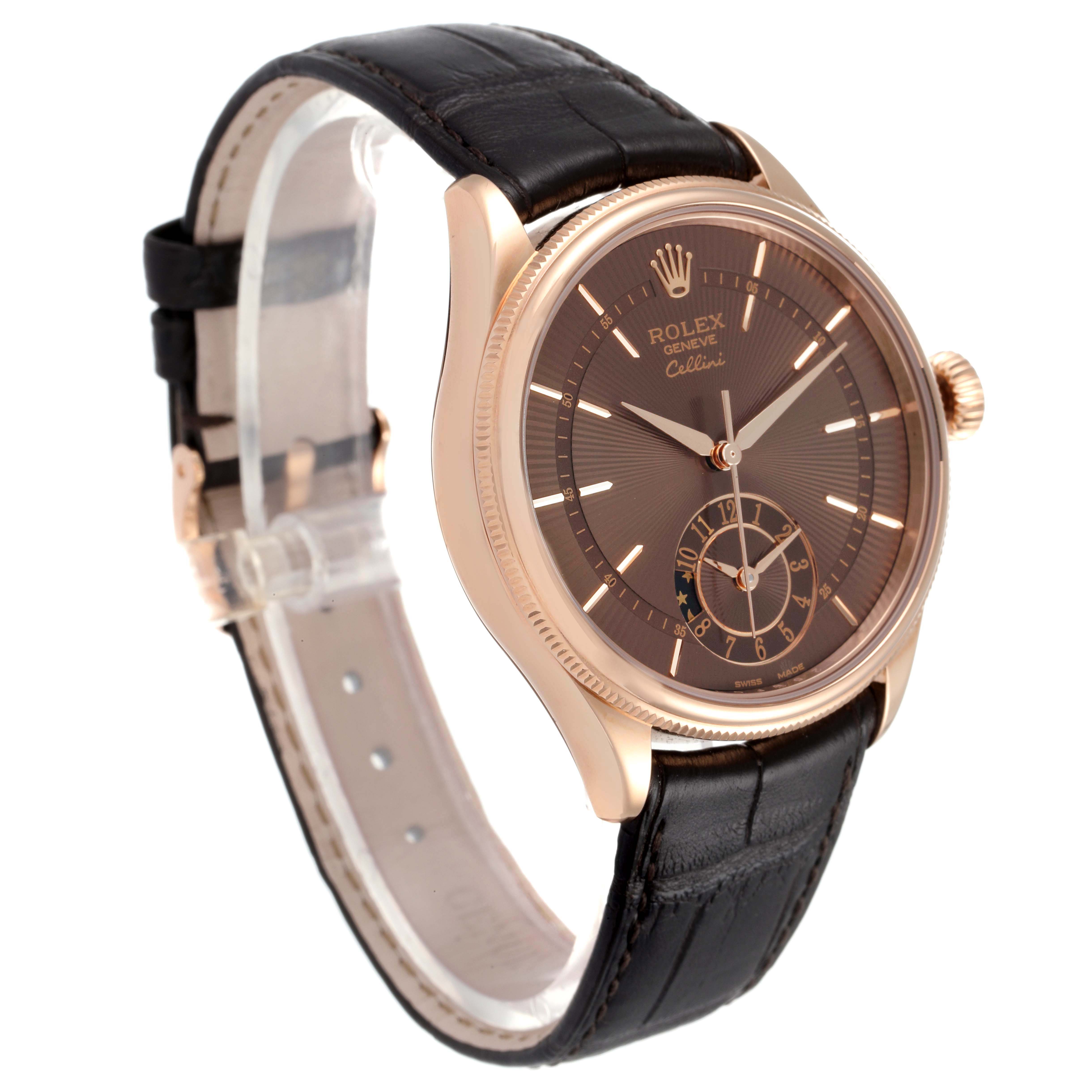 The Rolex Cellini 50525 Men
s Rose Gold Brown Dial 50525 Men
s Rose Gold Brown Dial watch is shown from a front angle, displaying its dial, case, crown, and leather strap.