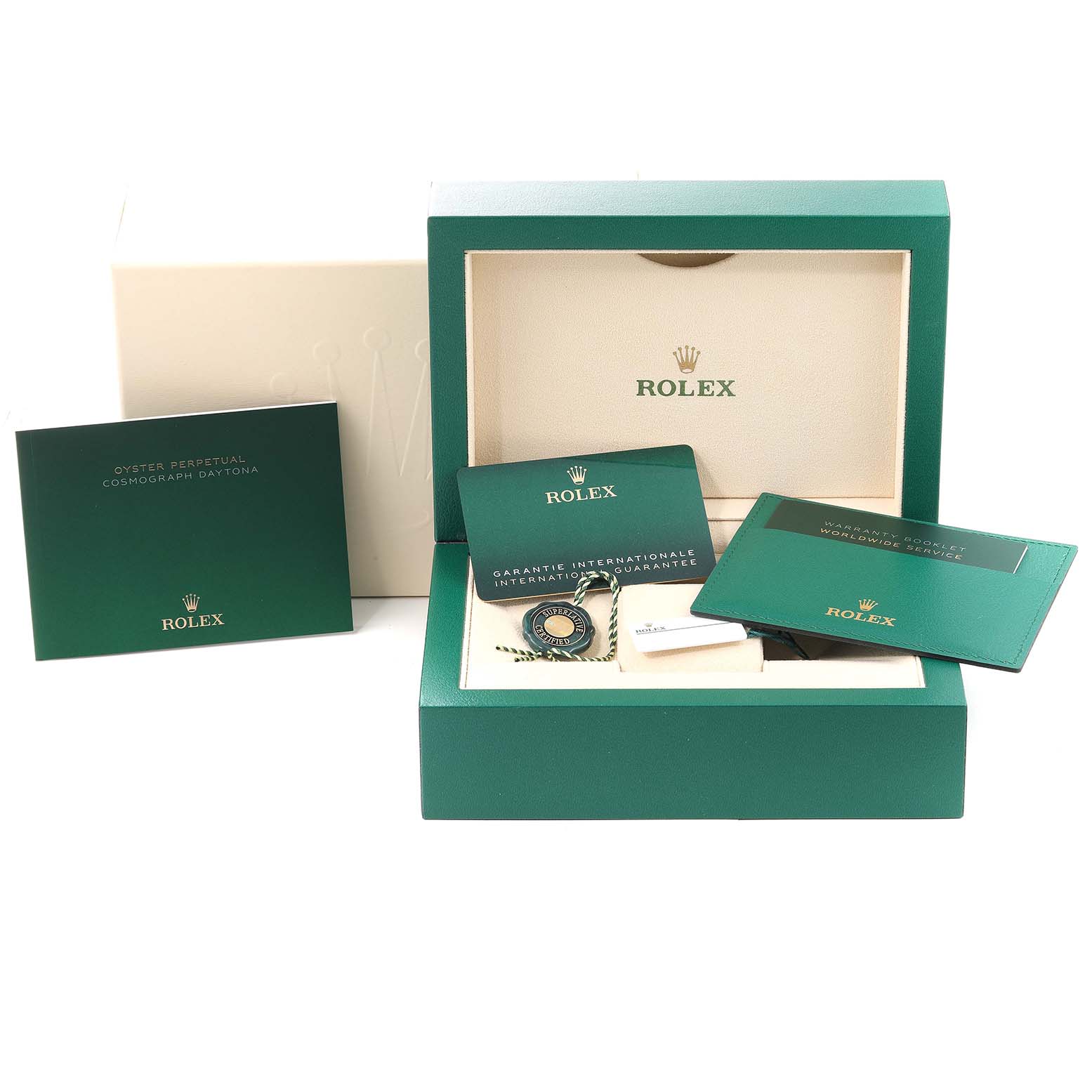 The image shows the accessories of the Rolex Daytona 116500 Men's Stainless Steel Black Dial 116500 Men's Stainless Steel Black Dial, including the box, warranty cards, and booklets.