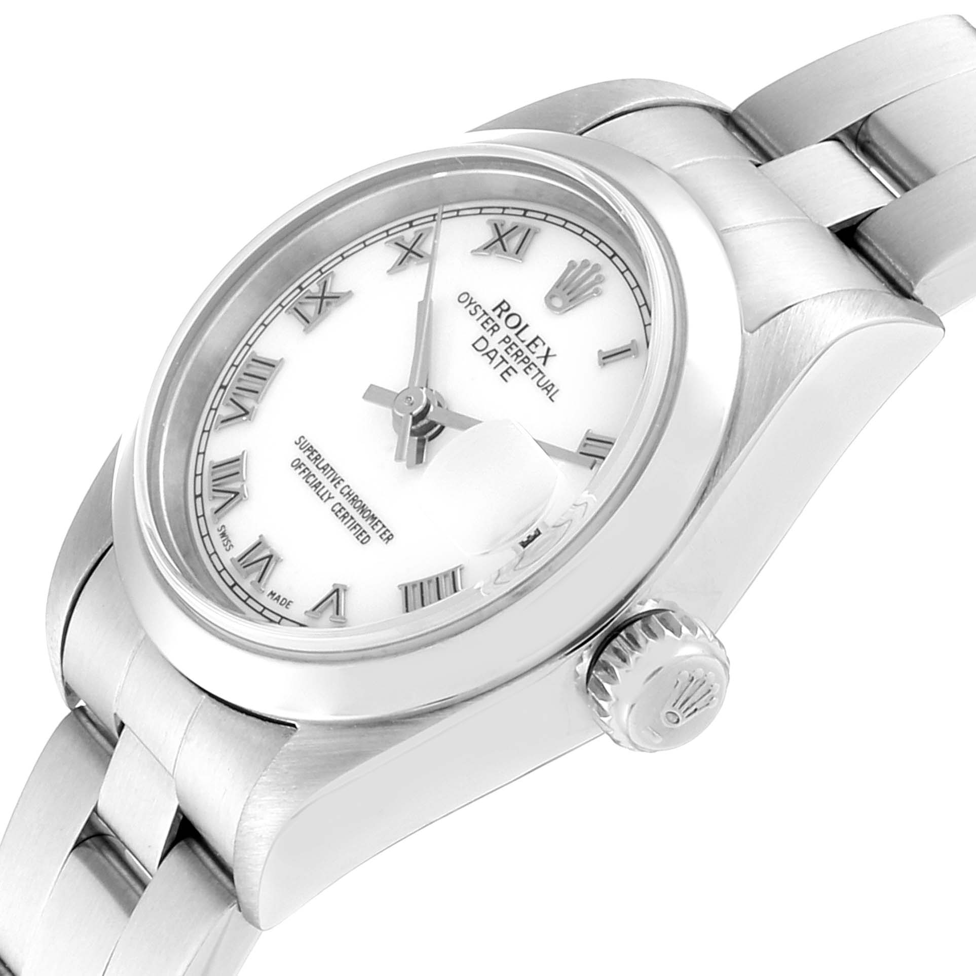 The image shows a close-up angled view of a Rolex Date 79160  Women
s Stainless Steel White Dial 79160  Women
s Stainless Steel White Dial model watch, highlighting the dial, crown, and part of the bracelet.