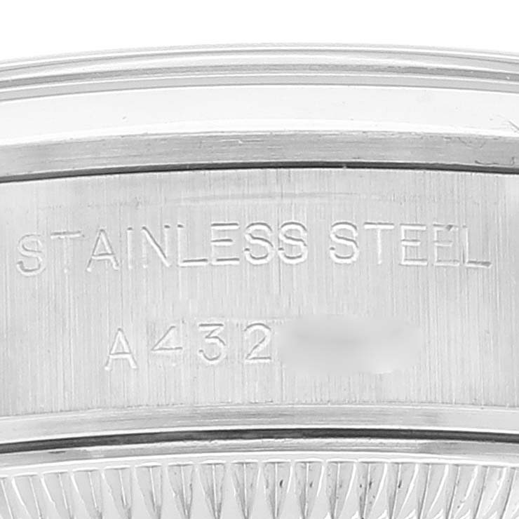 This image shows the stainless steel casing of a Rolex Date 69160 Women
s Stainless Steel White Dial 69160 Women
s Stainless Steel White Dial model watch with engraved markings.