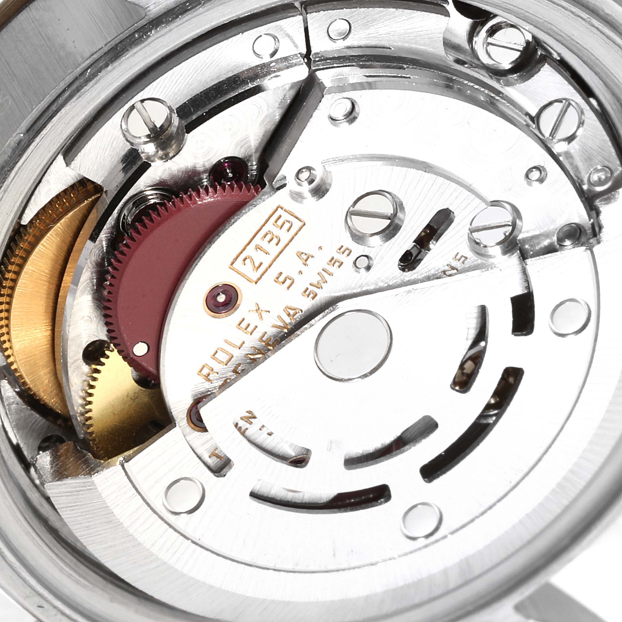 This close-up image showcases the internal movement mechanics of a Rolex Datejust 69173 Women
s Steel and Gold (two tone) Champagne Dial 69173 Women
s Steel and Gold (two tone) Champagne Dial watch.