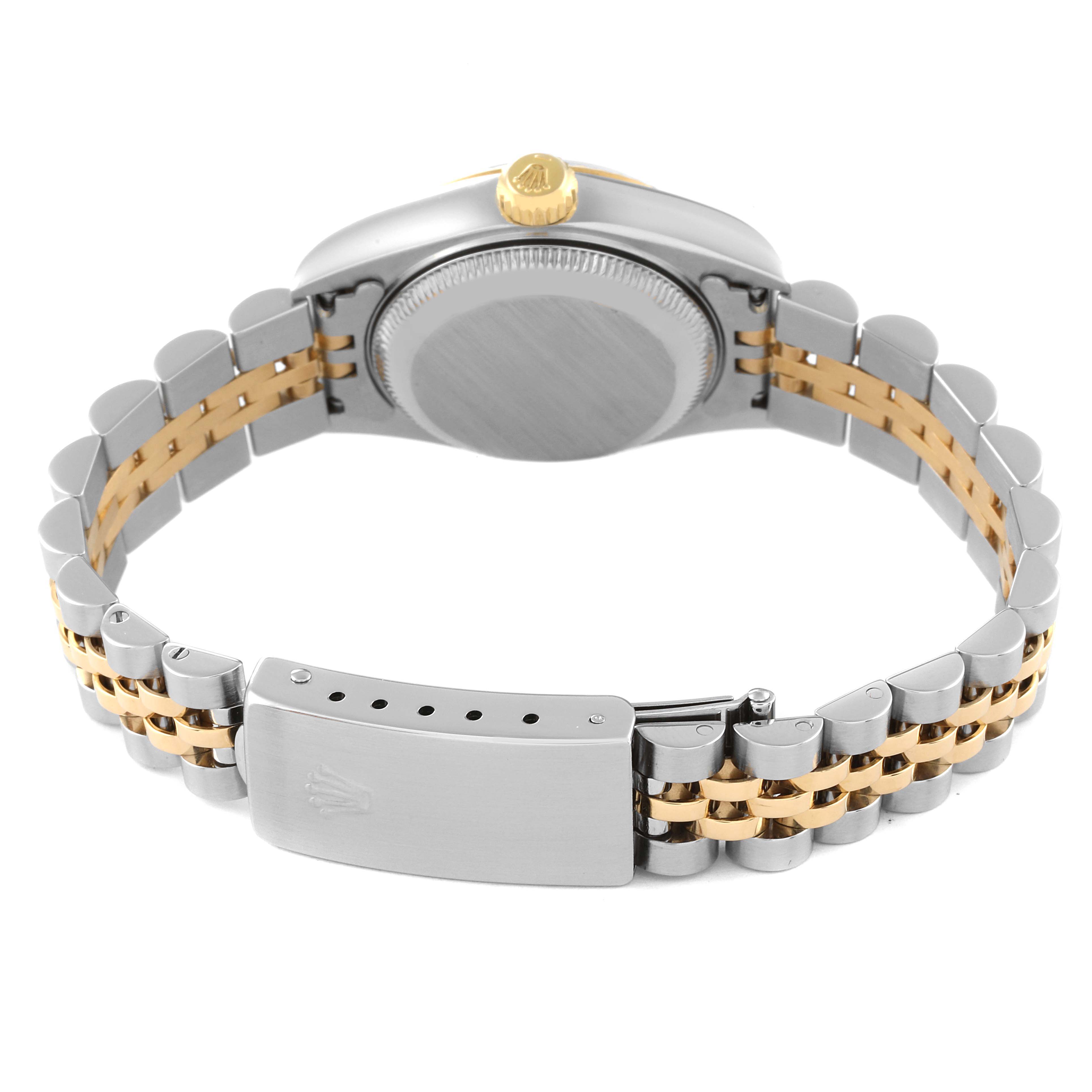 This image shows the back and clasp of a Rolex Datejust 79173 Women's Steel and Gold (two tone) Grey Dial 79173 Women's Steel and Gold (two tone) Grey Dial watch with a two-tone bracelet and crown.