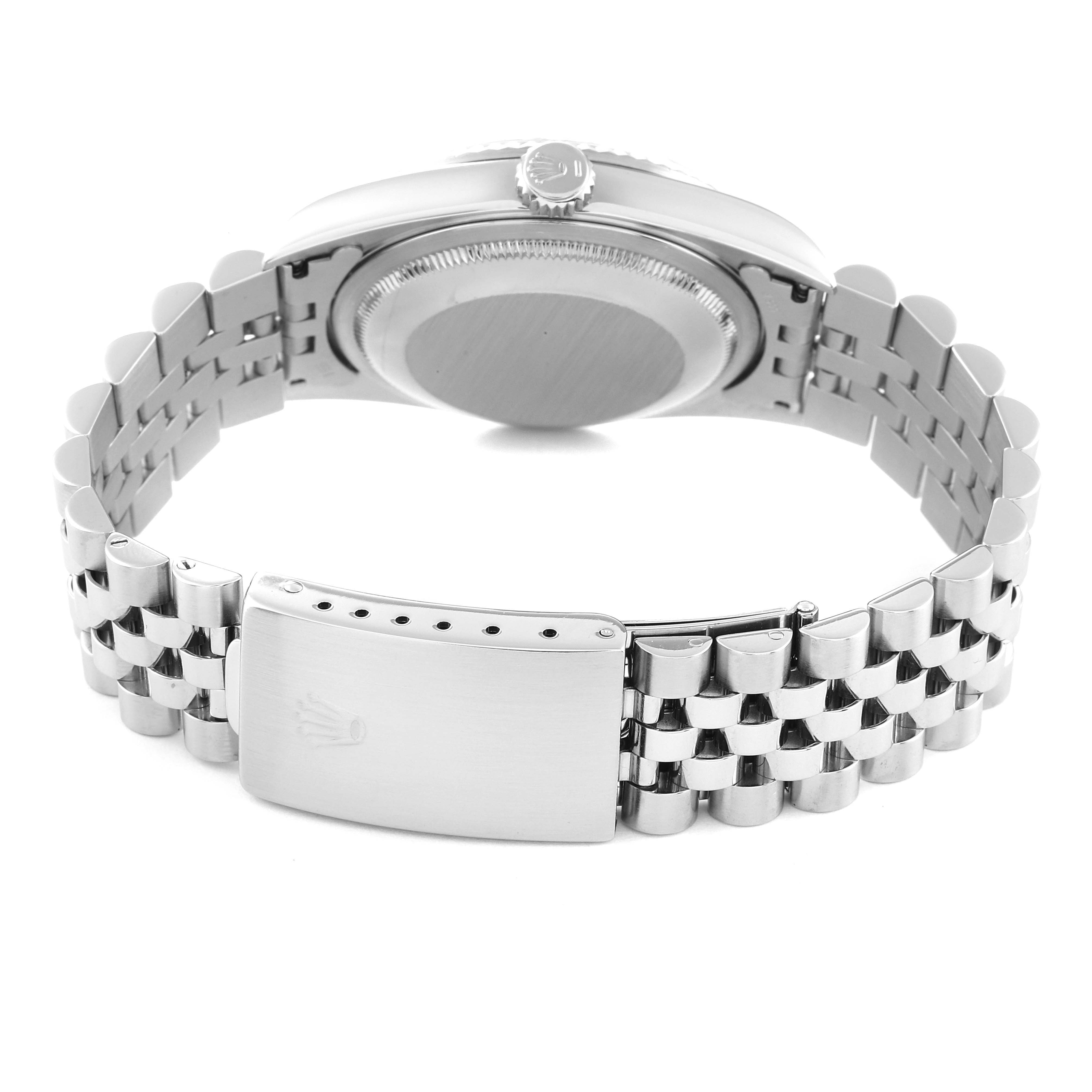 This image shows the backside of a Rolex Datejust 16234 Men's Stainless Steel Black Dial 16234 Men's Stainless Steel Black Dial watch, including the bracelet, clasp, and case back.