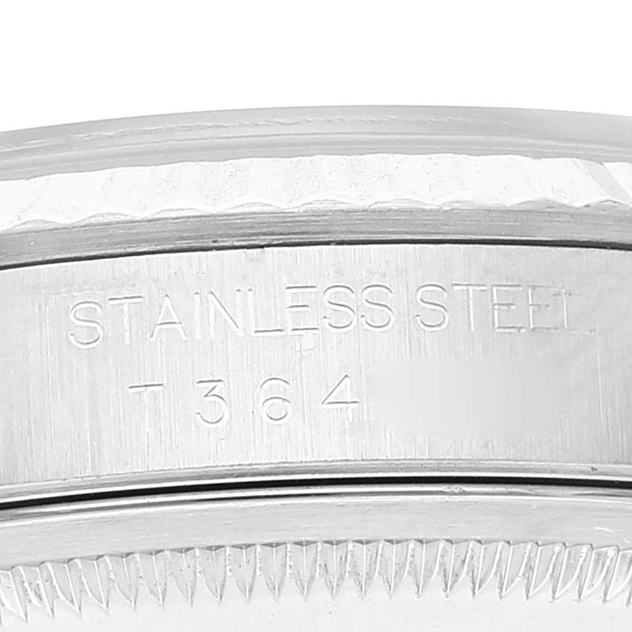 The image shows a close-up of a stainless steel casing with engraved markings for the Rolex Datejust 16234 Men's Stainless Steel Black Dial 16234 Men's Stainless Steel Black Dial watch.