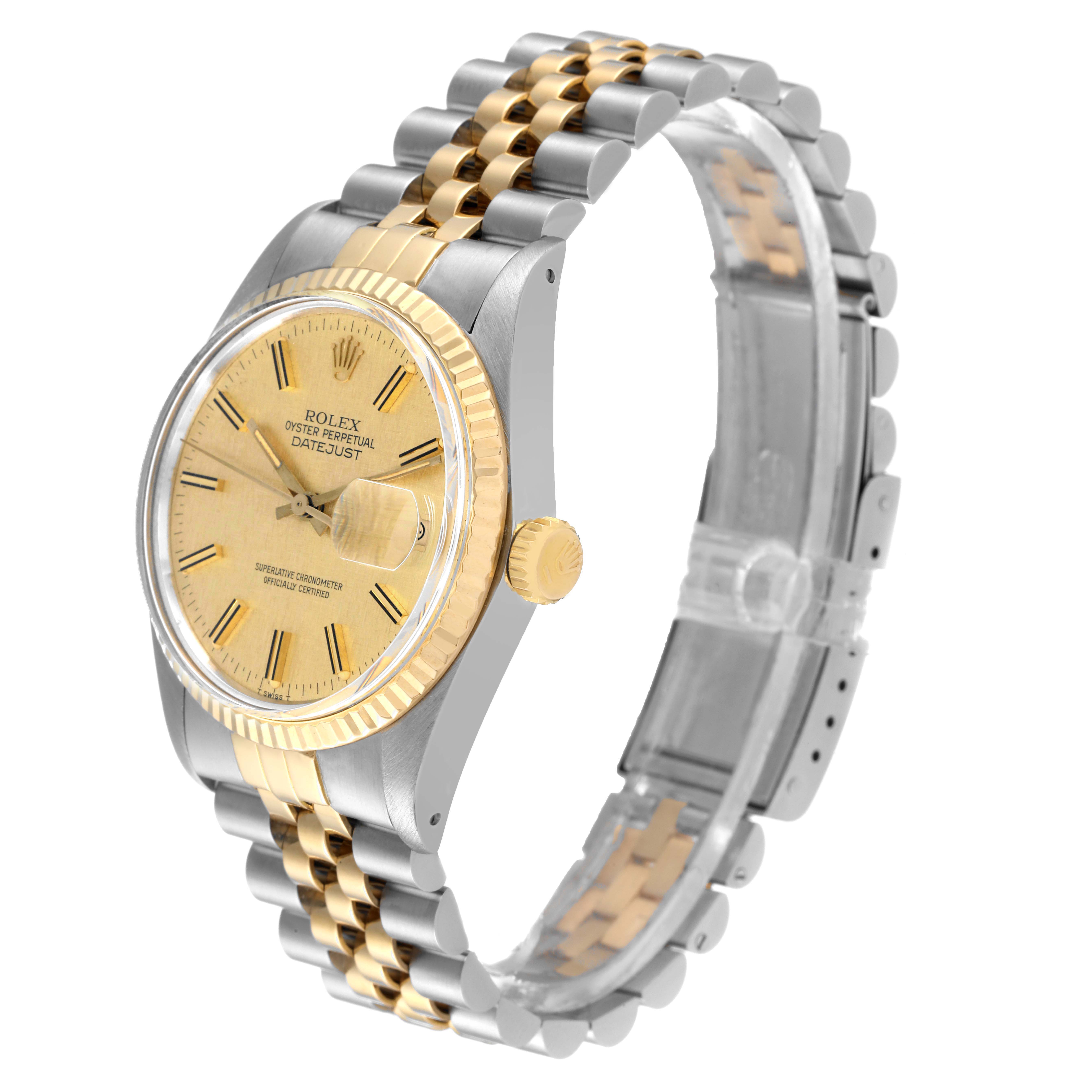 The image shows a Rolex Vintage Collection 16013 Men
s Steel and Gold (two tone) Champagne Dial 16013 Men
s Steel and Gold (two tone) Champagne Dial watch at a 3/4 angle, highlighting its gold dial, fluted bezel, and two-tone metal bracelet.