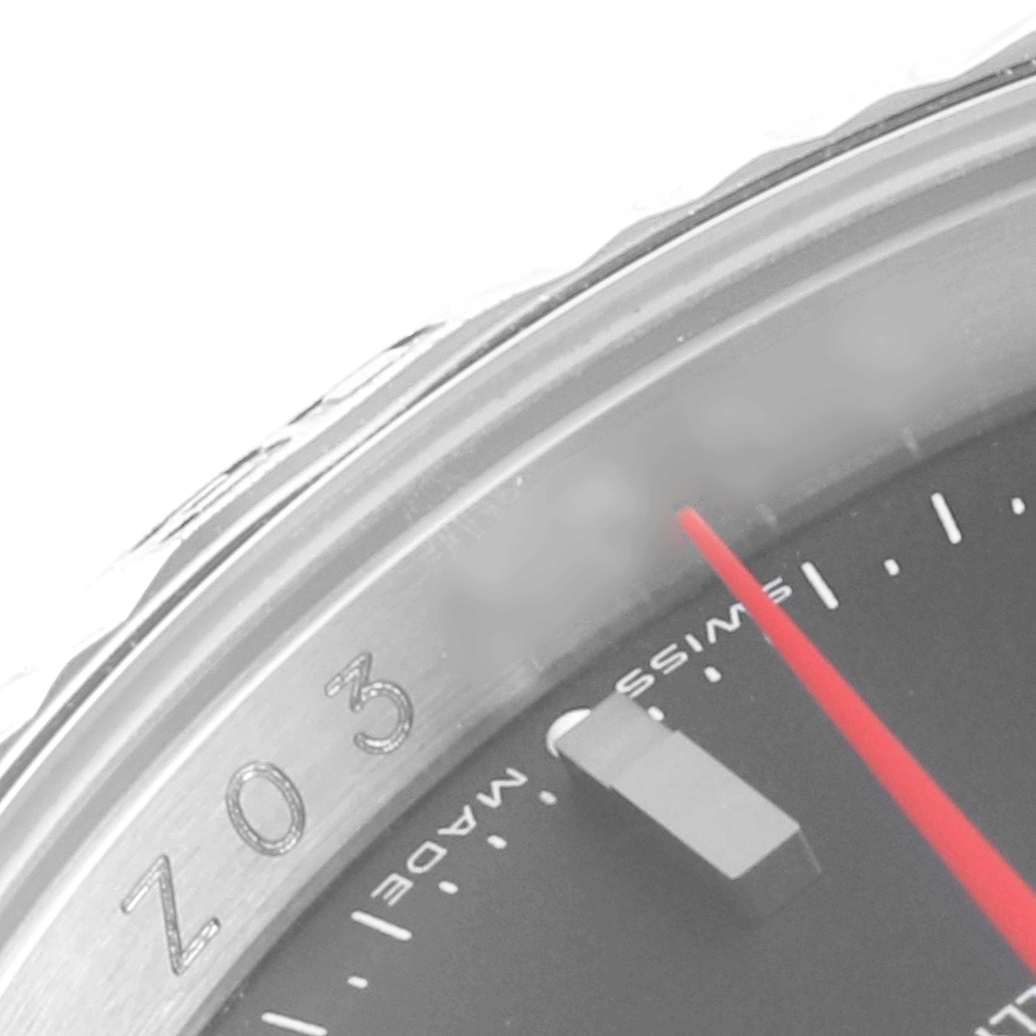 The image shows a close-up of the bezel, part of the dial, and the second hand of a Rolex Turn-o-Graph 116264 Men
s Stainless Steel Black Dial 116264 Men
s Stainless Steel Black Dial watch.