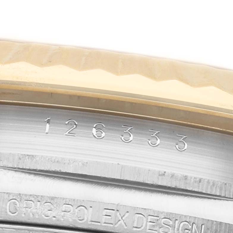 The image shows a close-up of the Rolex Datejust 41 126333 Men's Steel and Gold (two tone) Champagne Dial's case side, highlighting the watch's model number and design engraving.