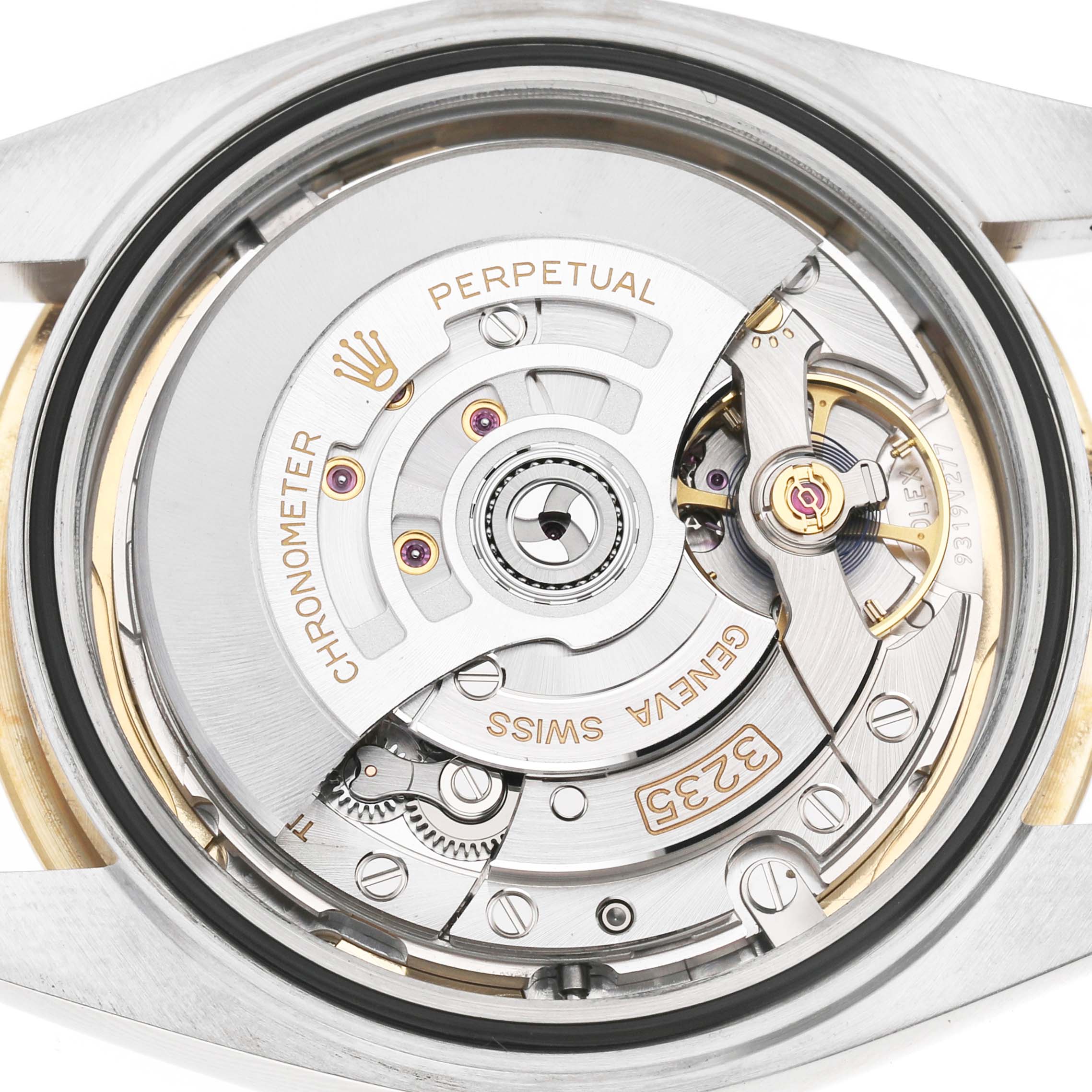 The image shows the movement from the back of a Rolex Datejust 41 126333 Men's Steel and Gold (two tone) Champagne Dial, highlighting the rotor and gear components.