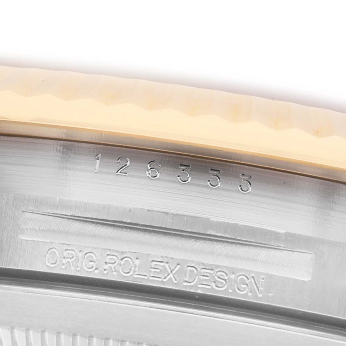 The image shows a close-up of the case's inner rim with model number engraving of the Rolex Datejust 41 12633 Men's Steel and Gold (two tone) Champagne Dial.