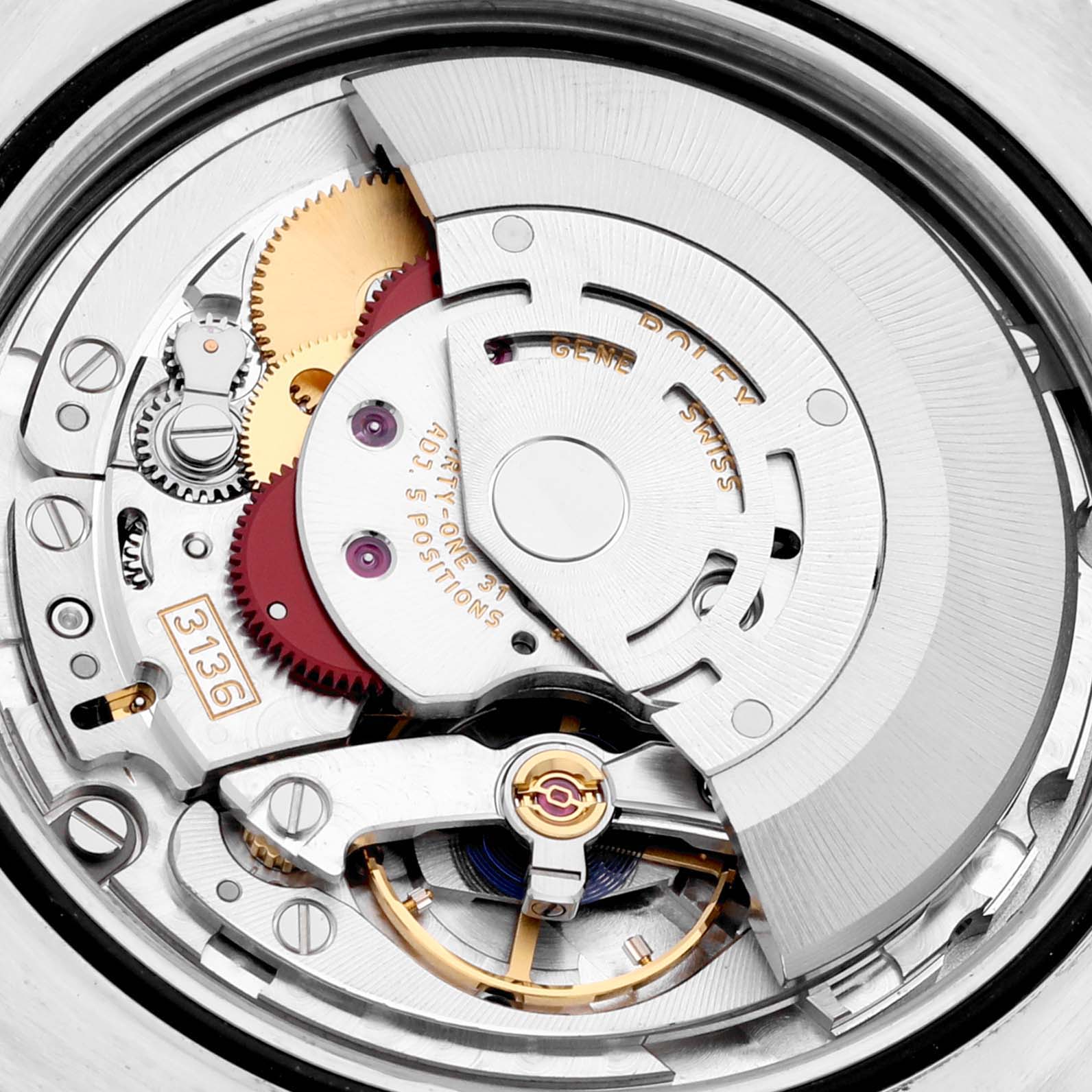 The image shows a close-up view of the movement inside a Rolex Datejust 41 116333 Men's Steel and Gold (two tone) Silver Dial 116333 Men's Steel and Gold (two tone) Silver Dial model, highlighting its intricate gears and mechanical parts.