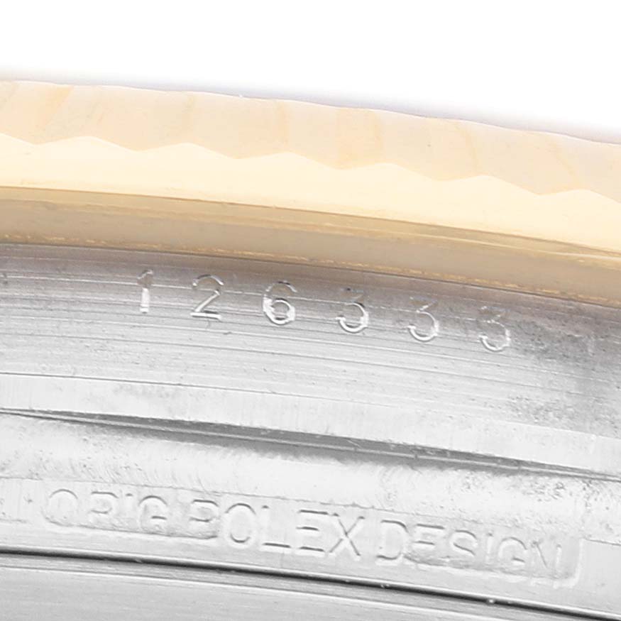 The image shows a close-up of the Rolex Datejust 41 126333 Men's Steel and Gold (two tone) White Dial model's watch case, focusing on the engraved model number.