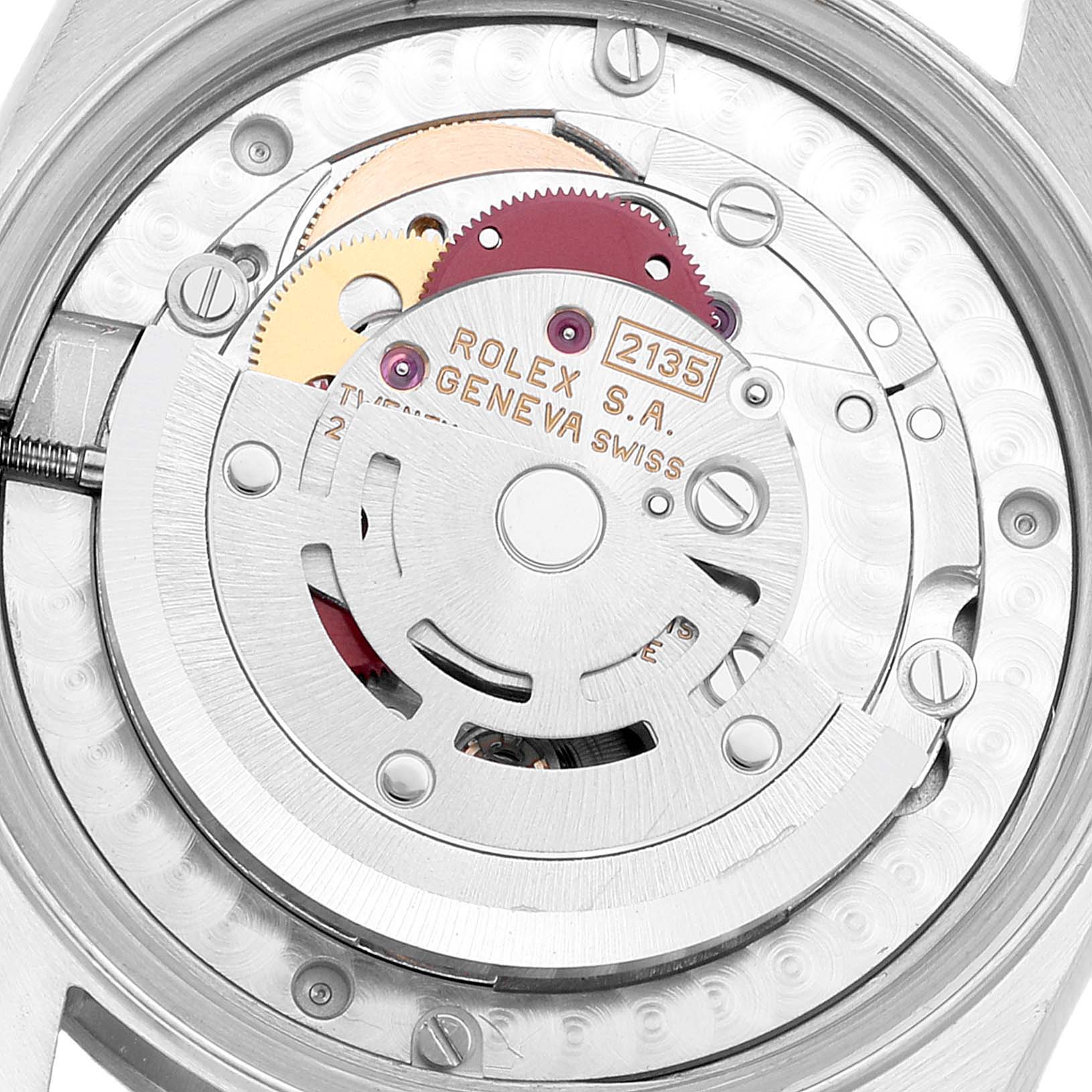 This image shows the internal mechanism and movement of a Rolex Mid-Size 68274 Women
s Stainless Steel Silver Dial 68274 Women
s Stainless Steel Silver Dial model watch from a close-up, top-down angle.