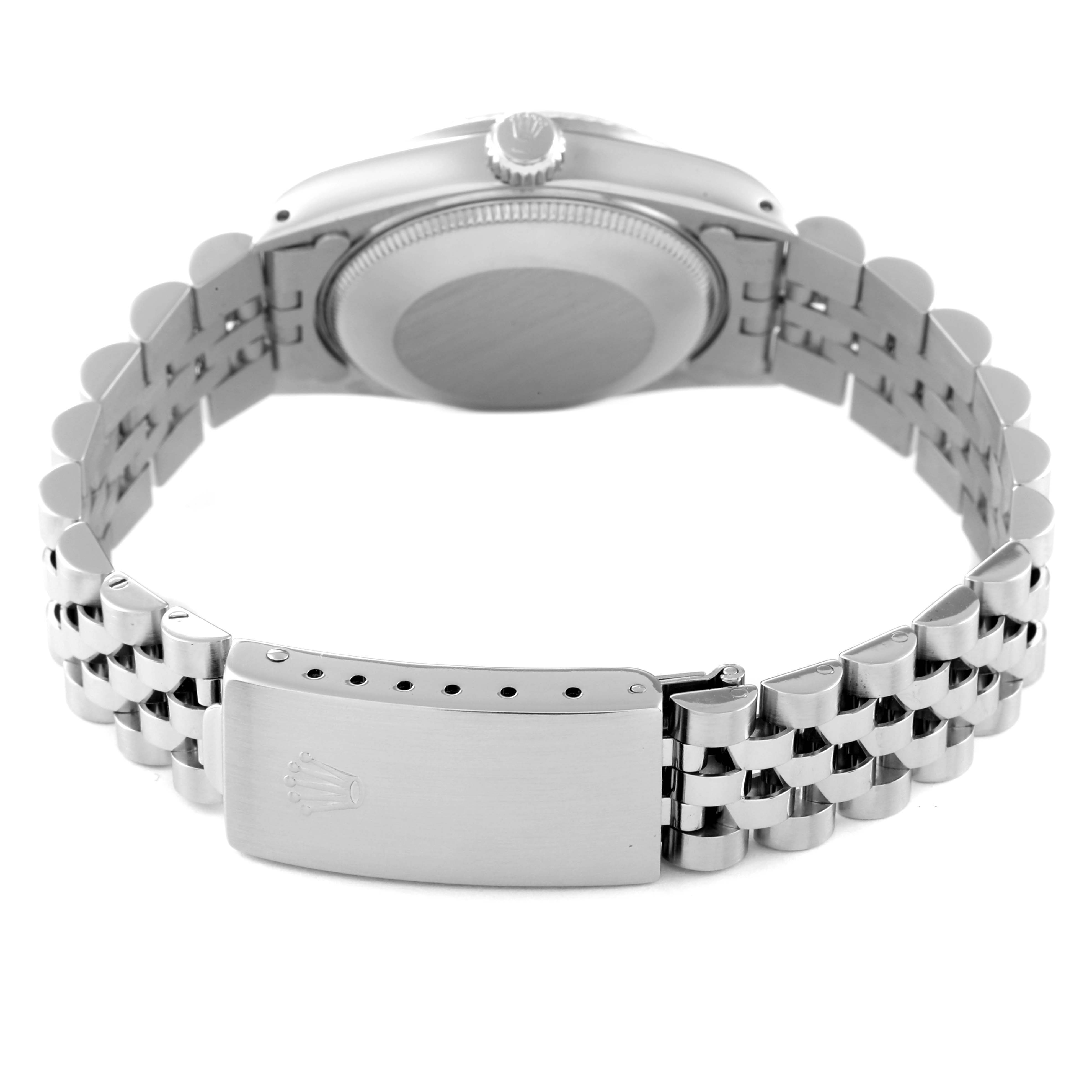 The image shows the back view of a Rolex Mid-Size 68274 Women
s Stainless Steel Silver Dial 68274 Women
s Stainless Steel Silver Dial watch, featuring its bracelet, clasp, and caseback.