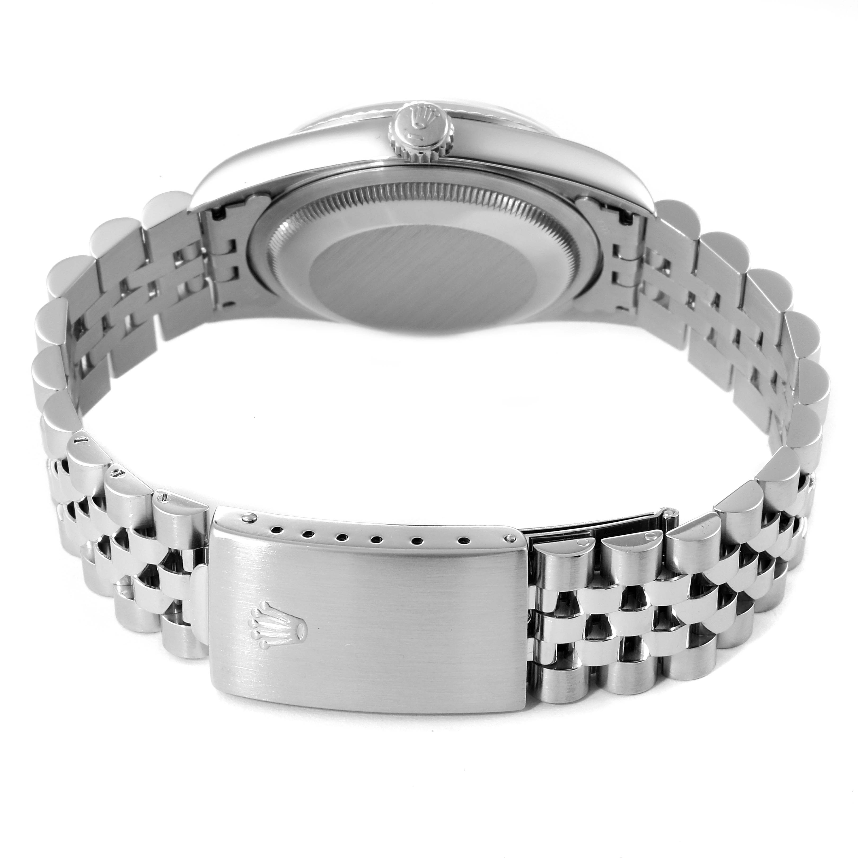 This is a rear view of a Rolex Datejust 16234 Men
s Stainless Steel Black Dial 16234 Men
s Stainless Steel Black Dial watch showcasing its case back, crown, and Jubilee bracelet with clasp.