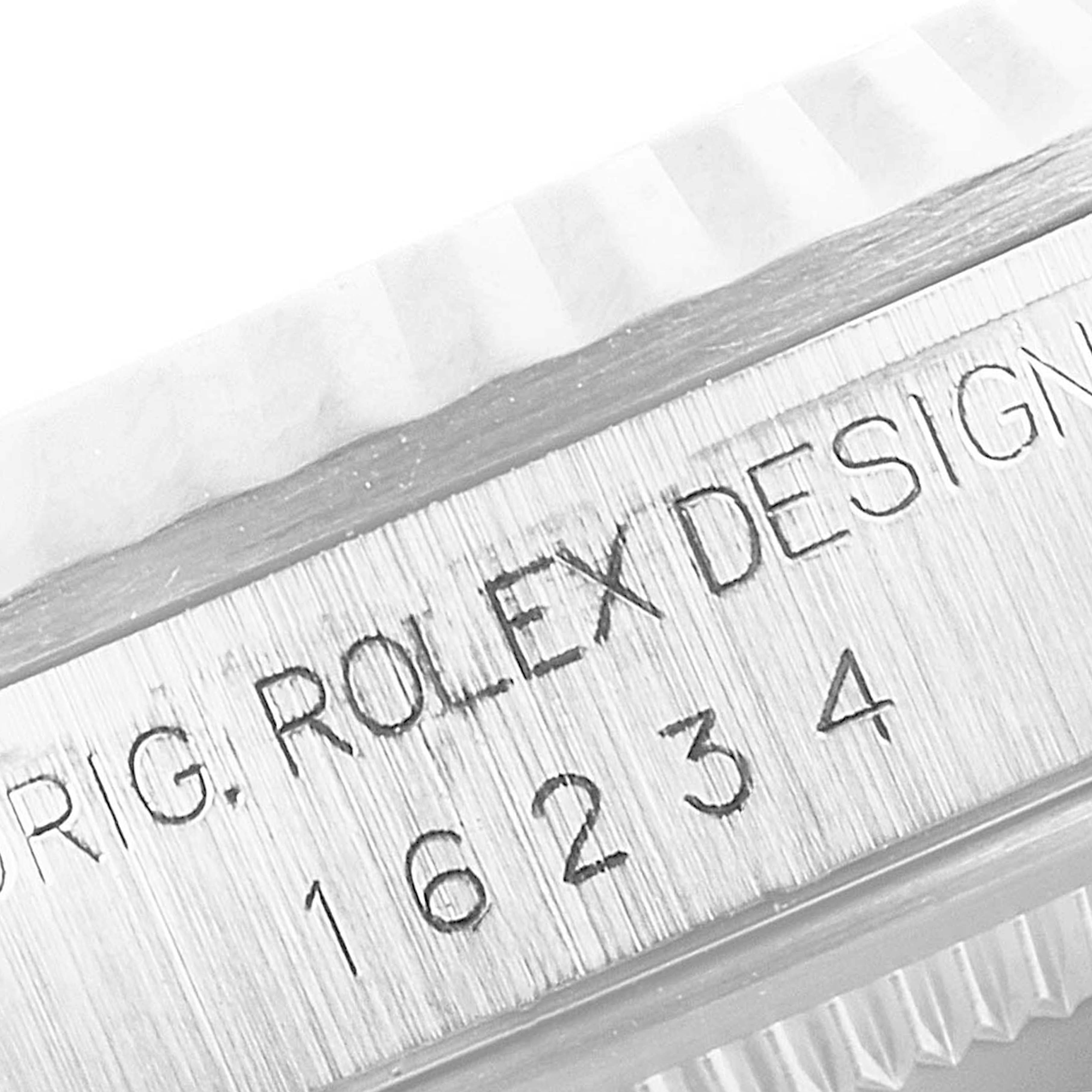 The image shows a close-up side view of the case, bezels, and model number on the Rolex Datejust 16234 Men
s Stainless Steel Black Dial 16234 Men
s Stainless Steel Black Dial watch.