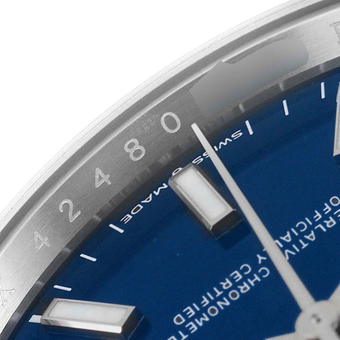 The image shows a close-up of the dial and bezel of a Rolex Datejust 126234 Men's Stainless Steel Blue Dial 126234 Men's Stainless Steel Blue Dial watch, focusing on the hour markers and "Swiss Made" text.