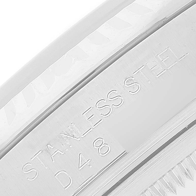 The image shows a close-up of the engraved details on the case back of a Rolex Datejust 116234 Men's Stainless Steel Silver Dial 116234 Men's Stainless Steel Silver Dial watch.