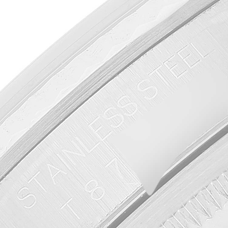 This image shows a close-up view of the bezel and engraved "STAINLESS STEEL" text on a Rolex Datejust 16234 Men's Stainless Steel Silver Dial 16234 Men's Stainless Steel Silver Dial watch.