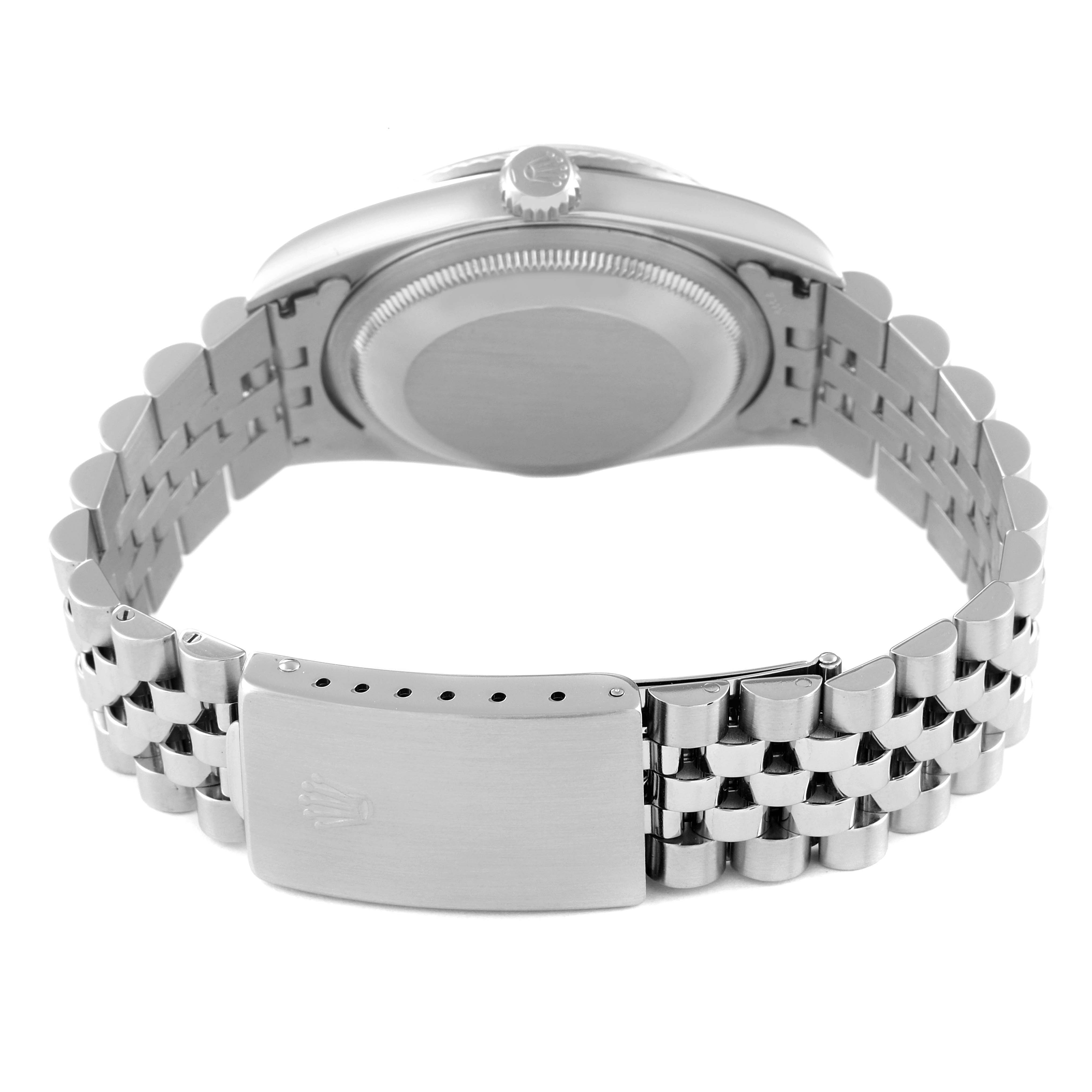 The image shows the back view of a Rolex Datejust 16234 Men's Stainless Steel Silver Dial 16234 Men's Stainless Steel Silver Dial watch, including the closed case back and bracelet clasp.