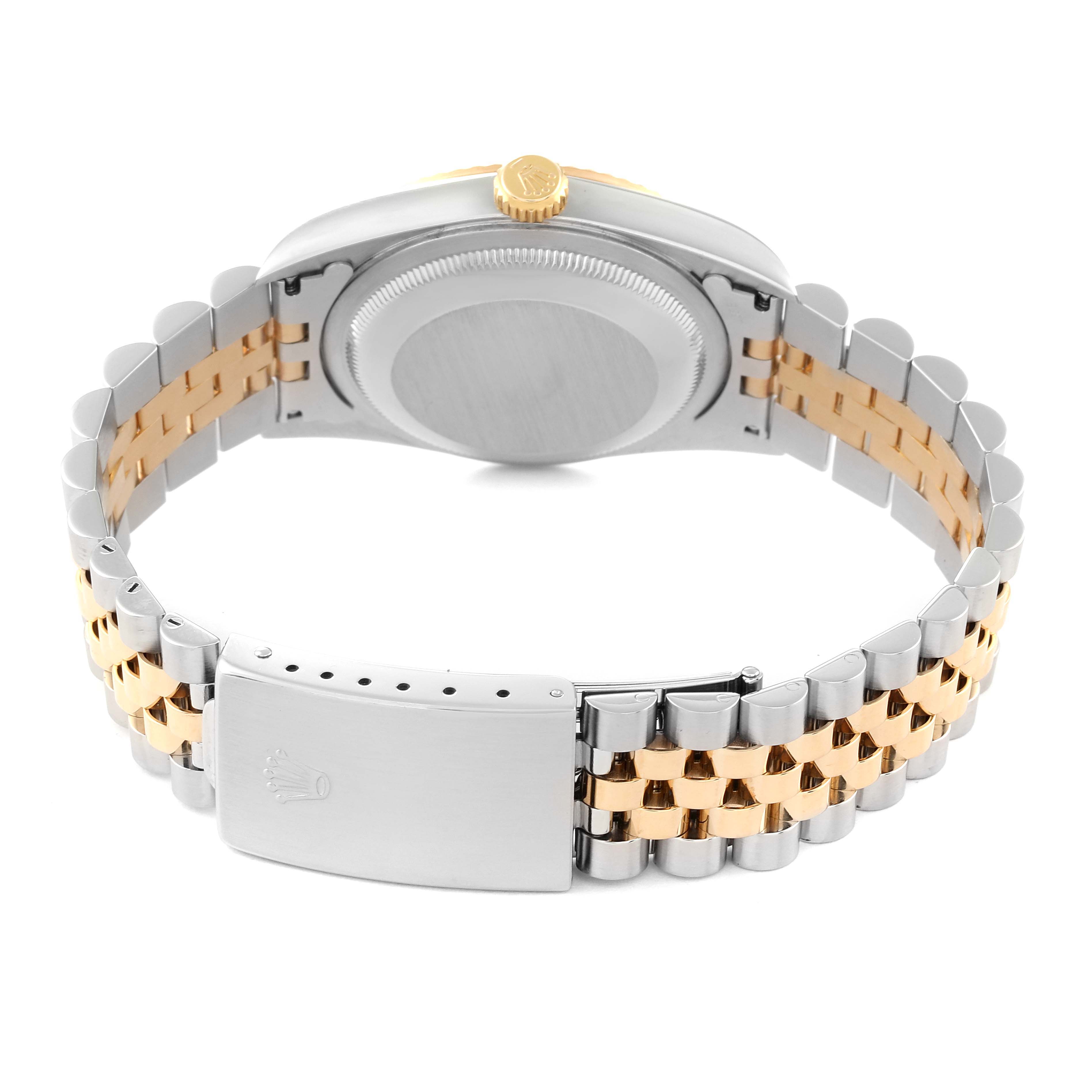 This image shows the back view of a Rolex Datejust 16233 Men's Steel and Gold (two tone) Champagne Dial 16233 Men's Steel and Gold (two tone) Champagne Dial watch, highlighting the case back, crown, and two-tone metal bracelet with clasp.