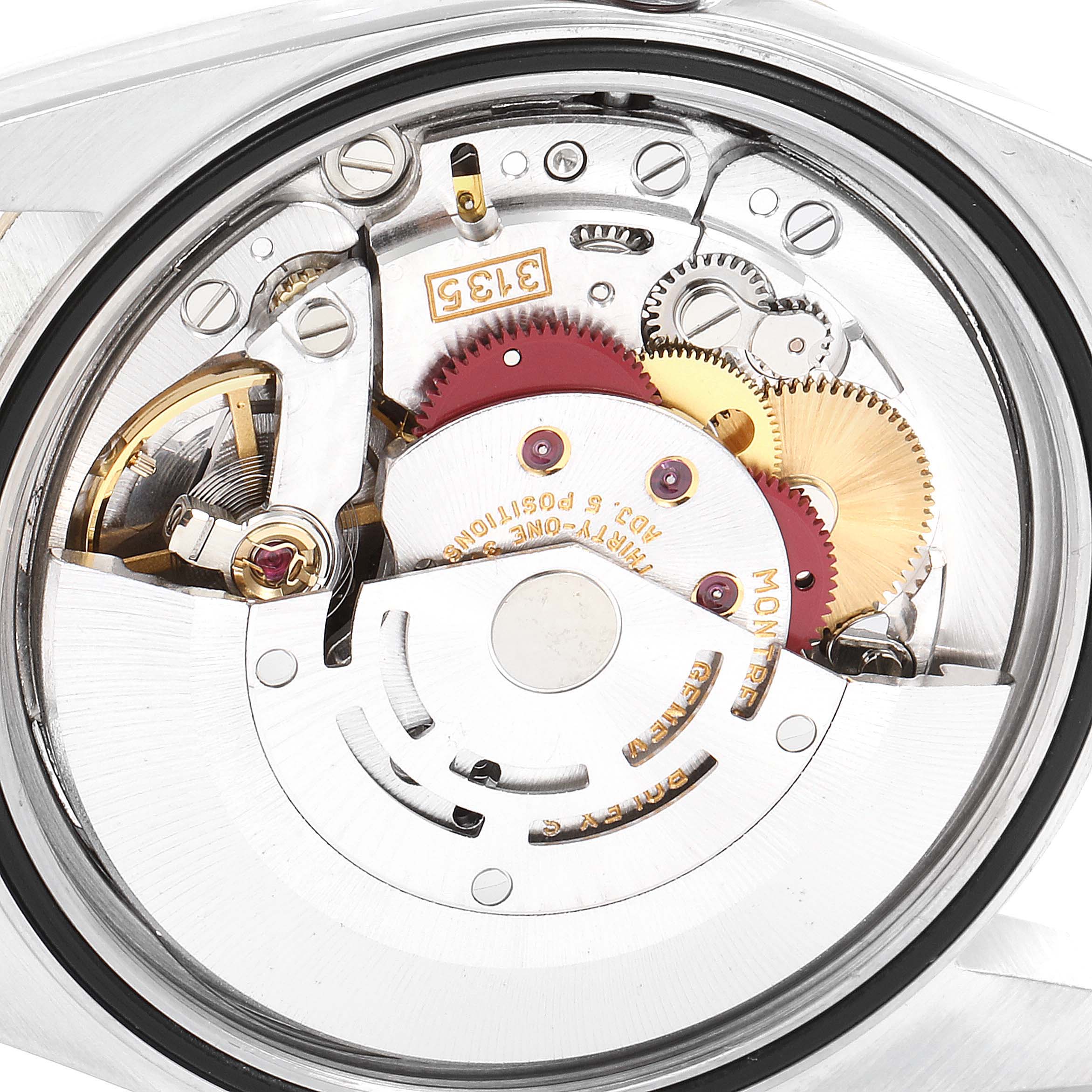 This image shows the movement and internal mechanics of a Rolex Datejust 16233 Men's Steel and Gold (two tone) Champagne Dial 16233 Men's Steel and Gold (two tone) Champagne Dial watch from a back angle.